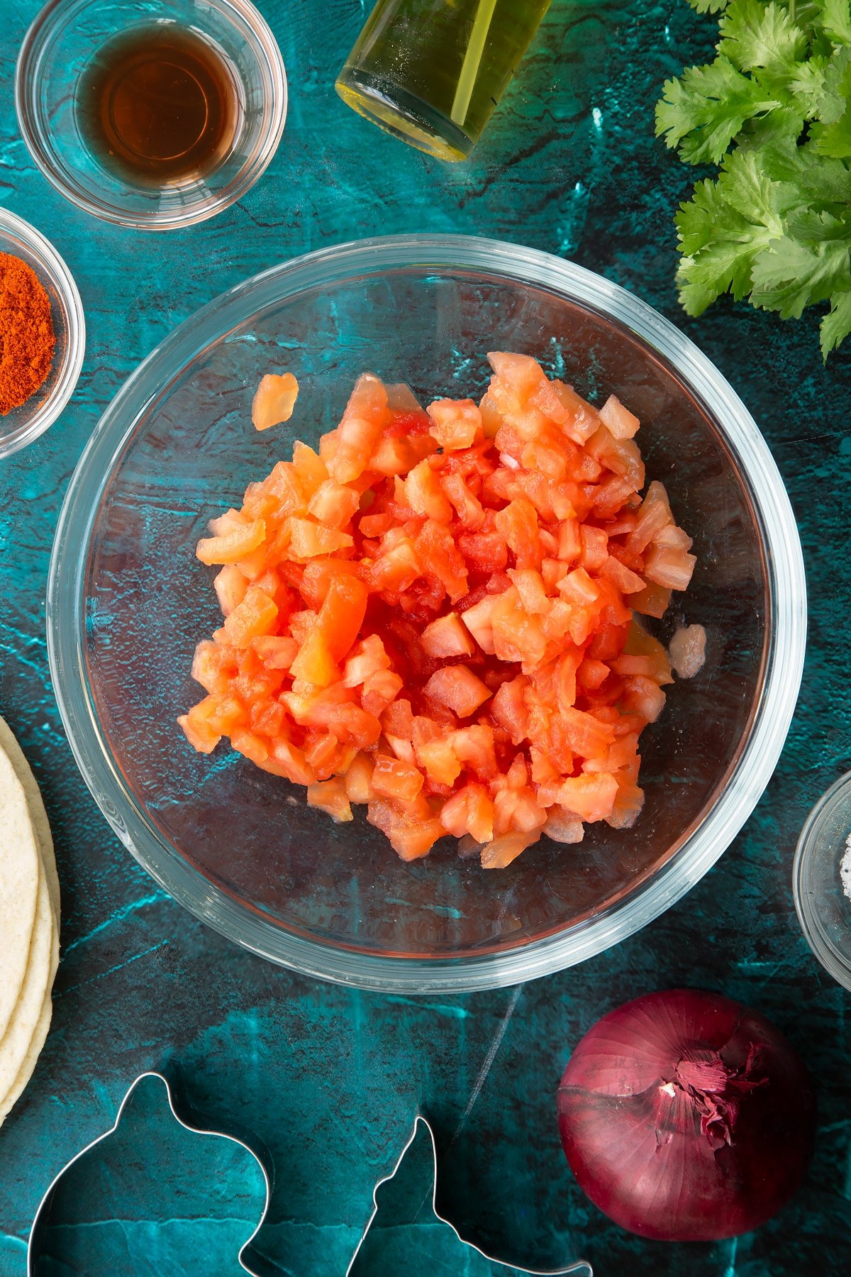 Chopped tomatoes in a glass bowl