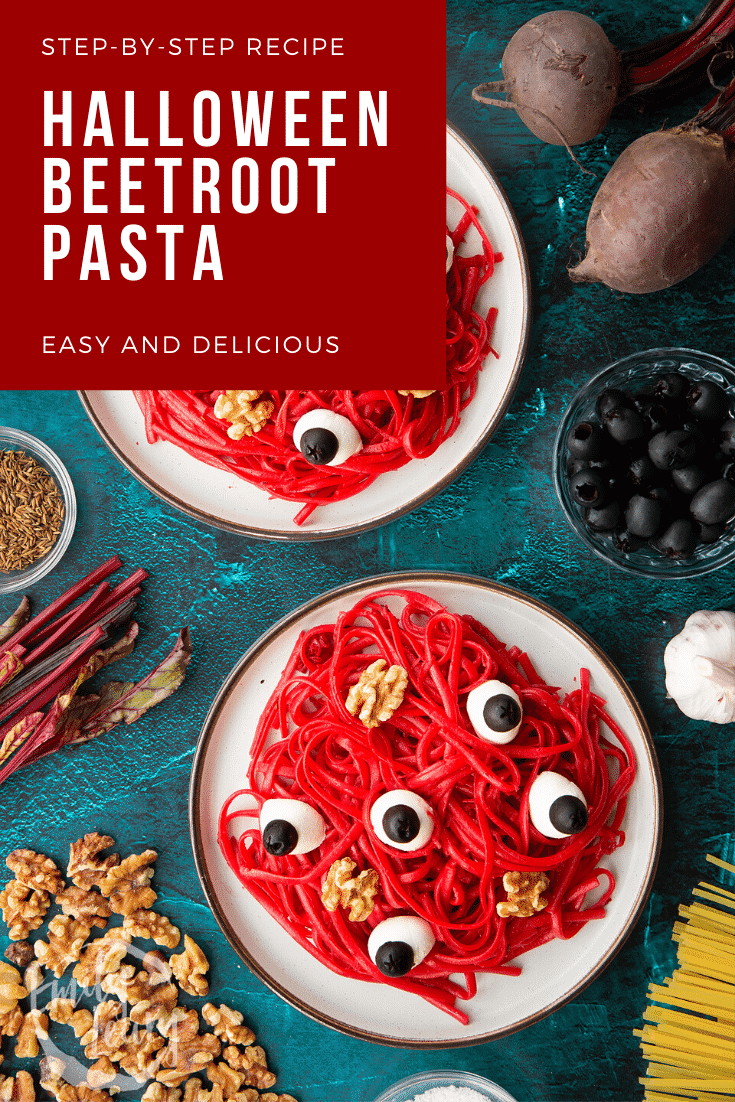 Two plates with a beetroot Halloween pasta recipe, topped with mozzarella eyes and walnut brains. Caption reads: Step-by-step recipe. Halloween beetroot pasta. Easy and delicious.