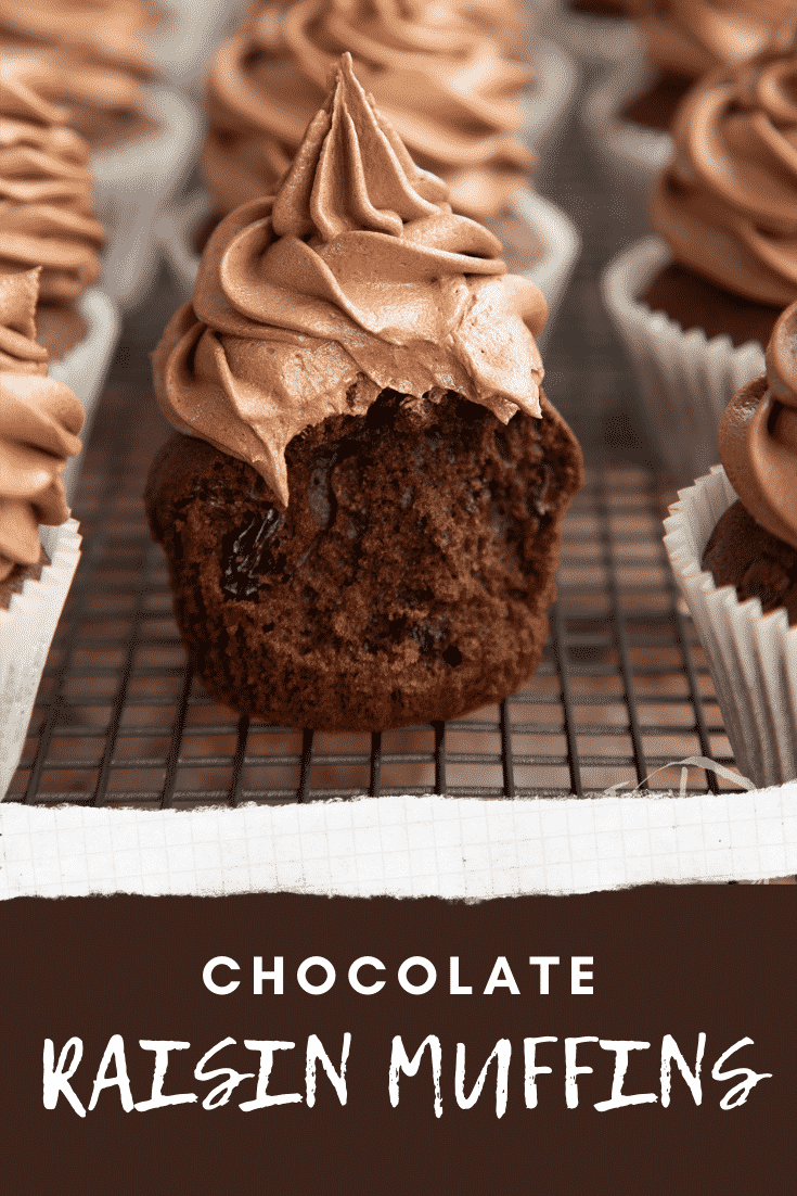 Chocolate raisin muffins with Nutella frosting on a cooling rack. The muffin in the fore is unwrapped with a bite out of it. Caption reads: Chocolate raisin muffins