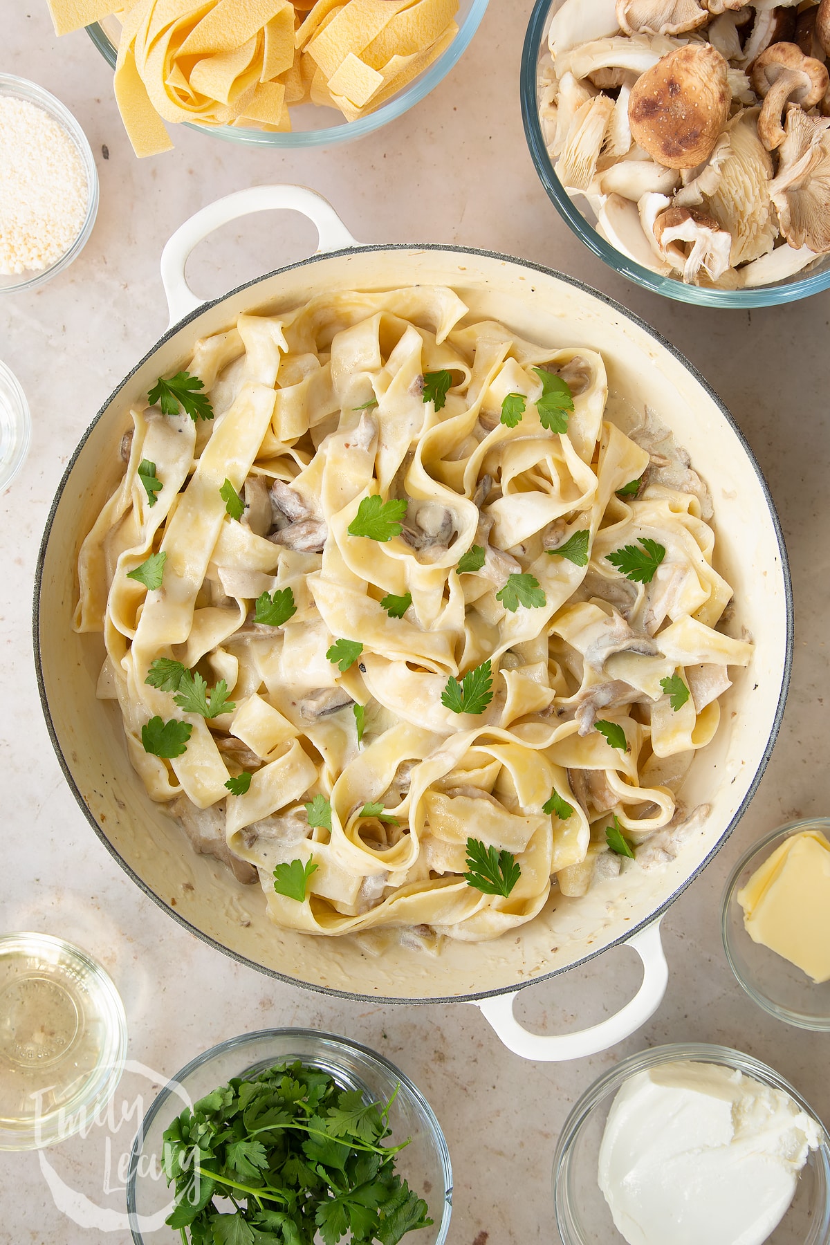 over head view of Creamy mushroom pappardelle in a large pan.