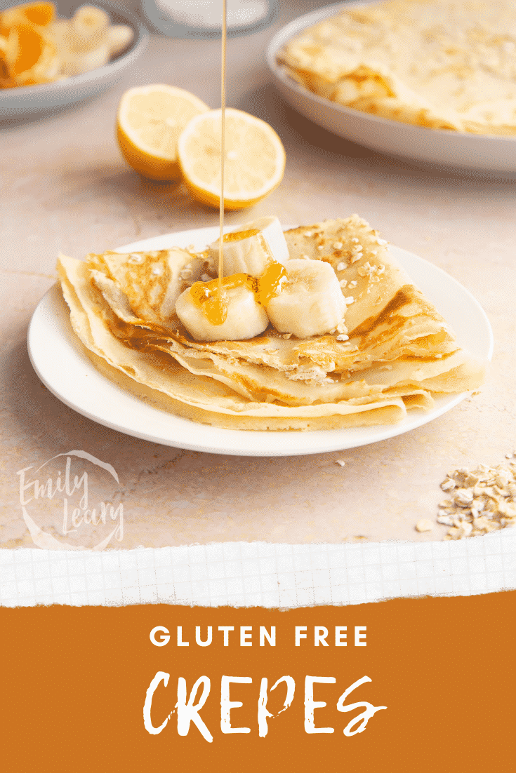 Gluten free crepe on a white plate. It is folded and topped with bananas and golden syrup. Caption reads: gluten free crepes