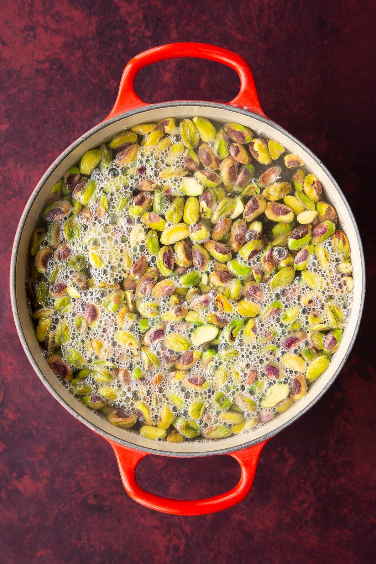 Overhead shot of the pistachio in pan.