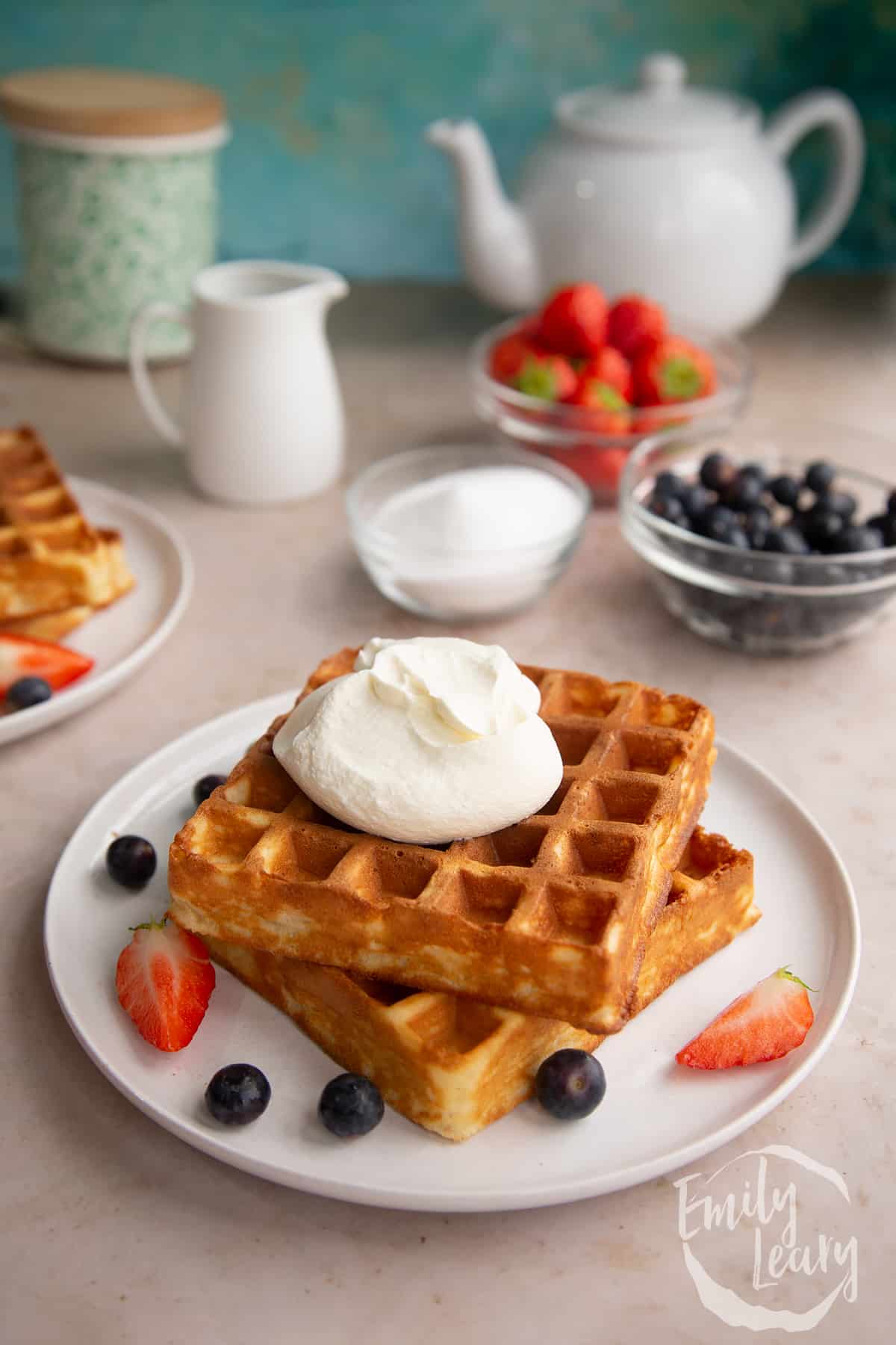 classic cooked waffles topped with yogurt and berries.