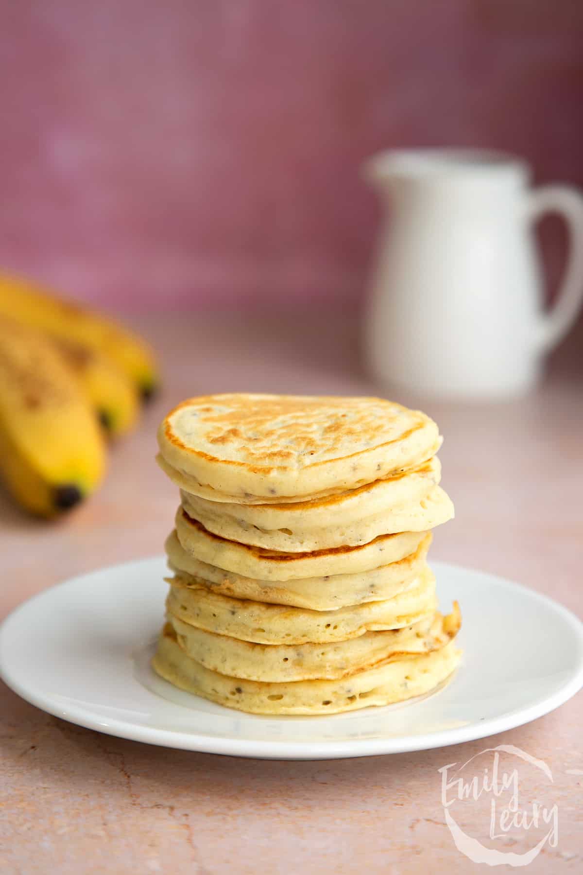 A stack of vegan chia pancakes on a small white plate. 