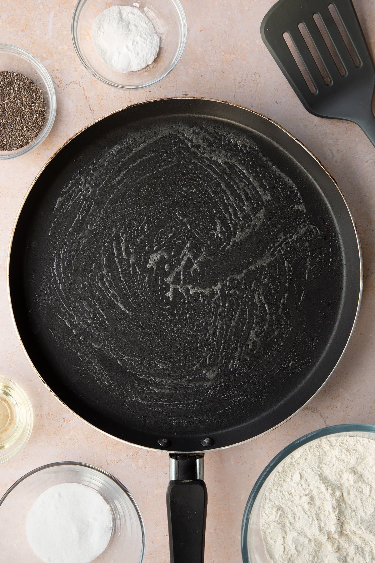 A pancake pan with a little melted butter.