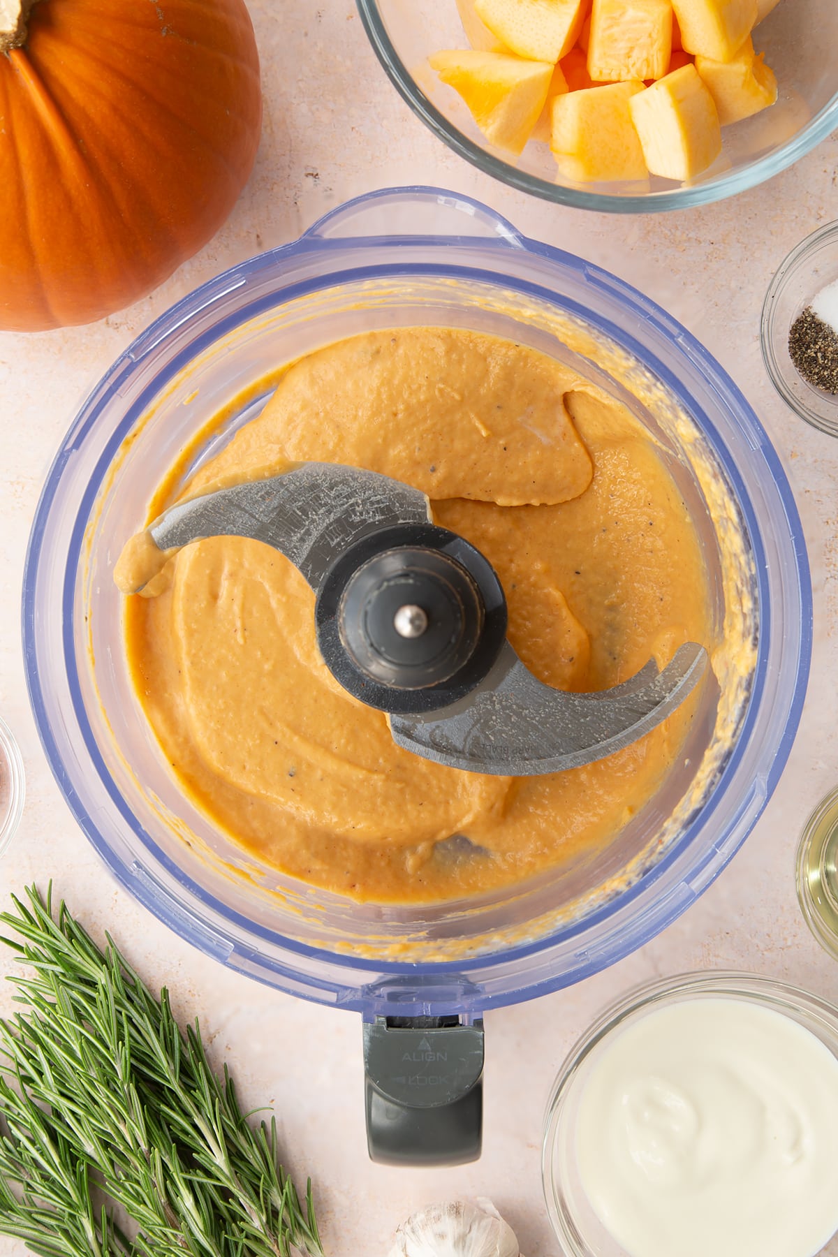 Vegan pumpkin dip in a food processor bowl.