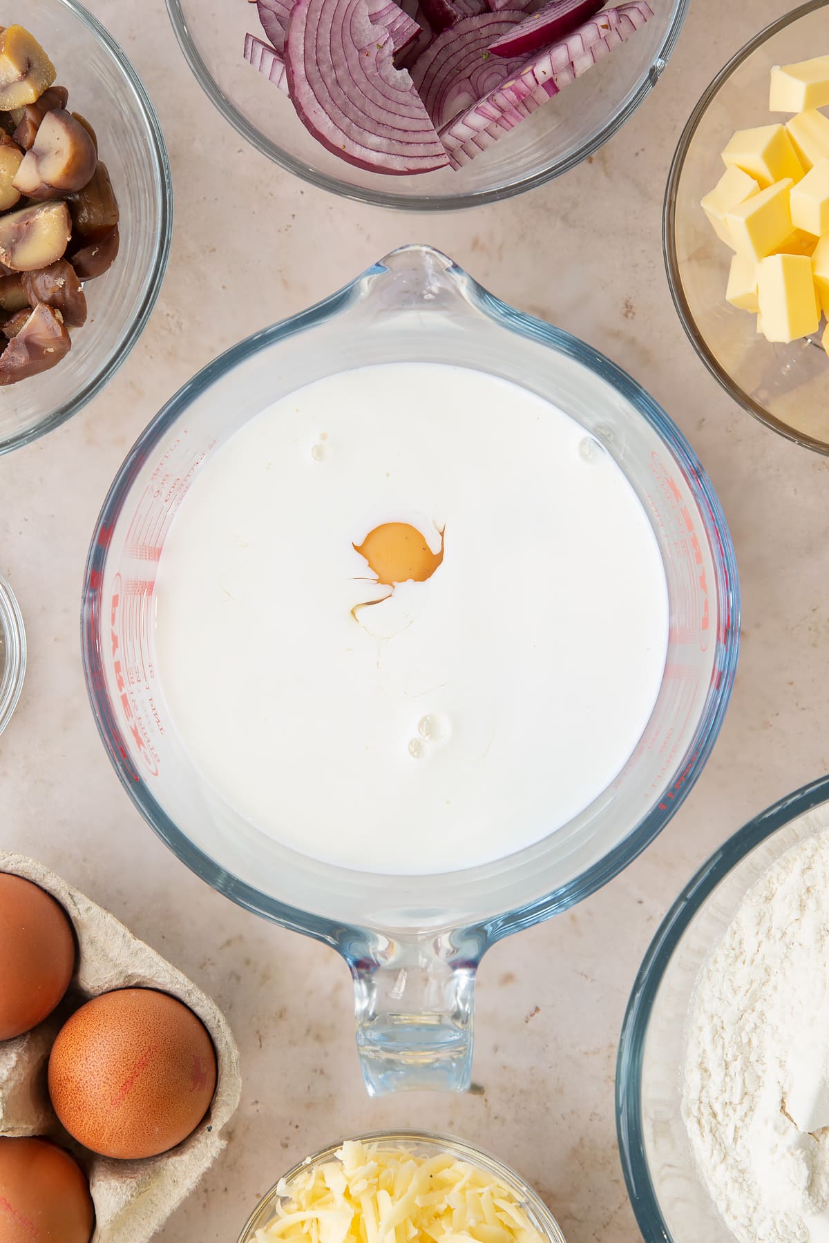 Overhead shot of milk and eggs in a jug. 