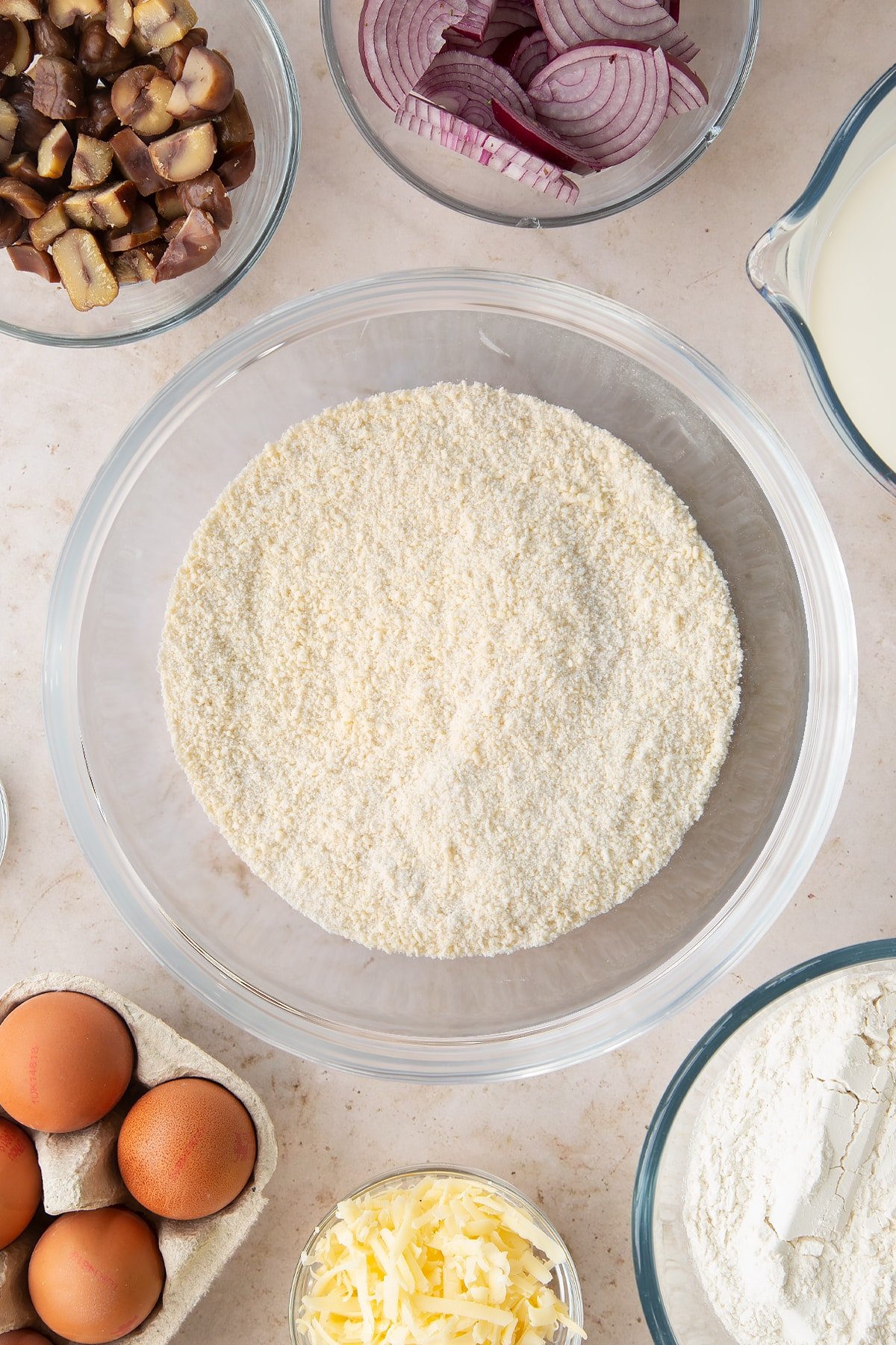 Overhead shot of the butter and flour in a mixing bowl having been mixed together. 