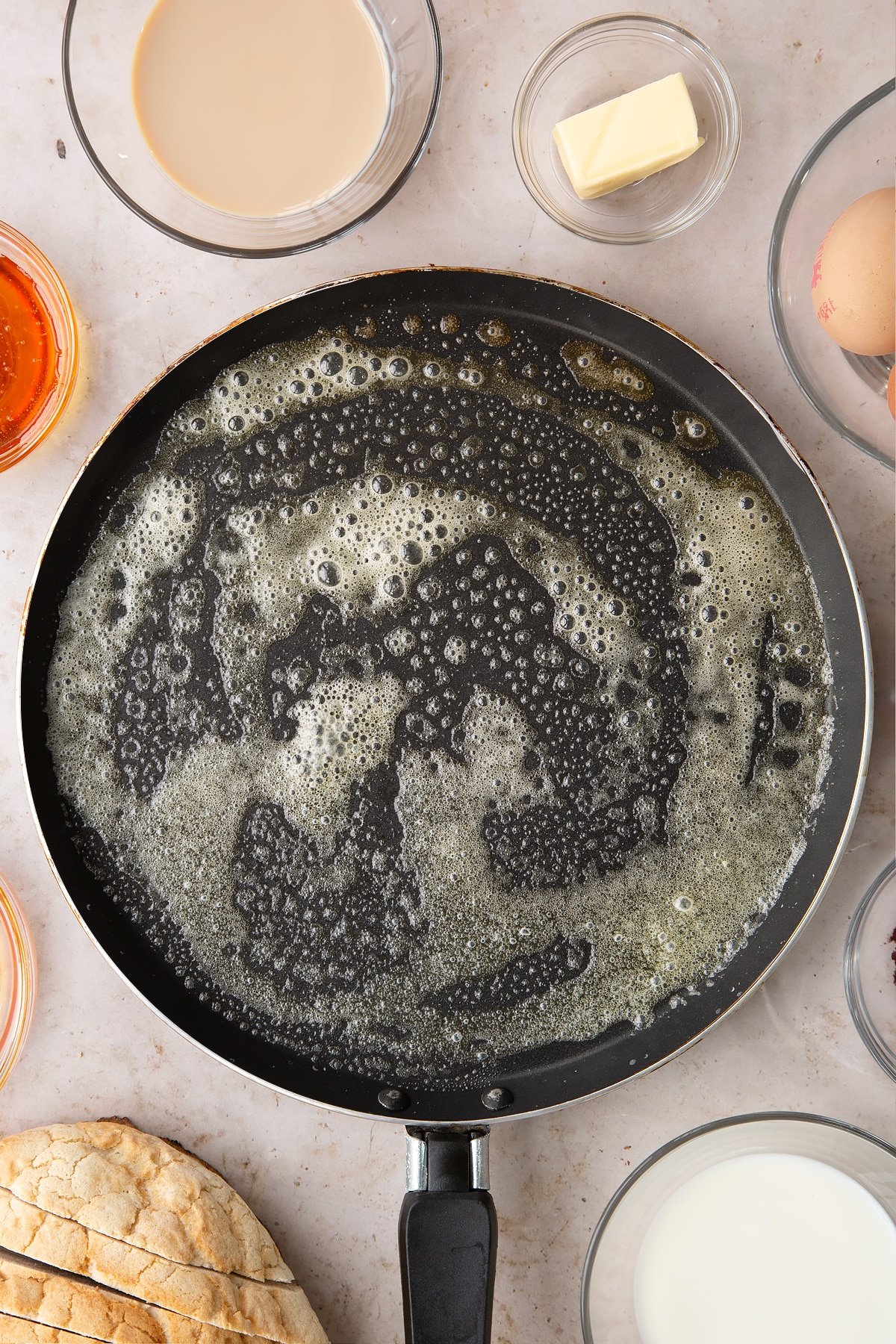 Butter melting on a pan.