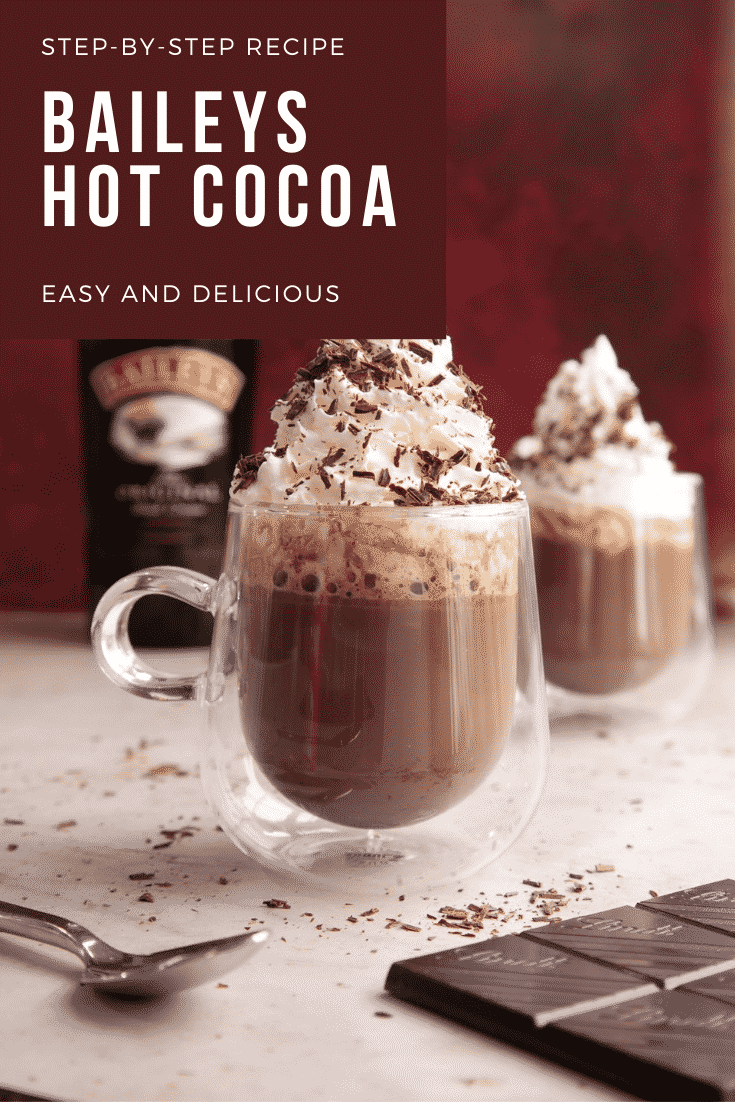 Two mugs of a rich Baileys hot chocolate recipe, topped with whipped cream and chocolate shavings. Caption reads: Step-by-step recipe. Baileys hot chocolate. Easy and delicious.