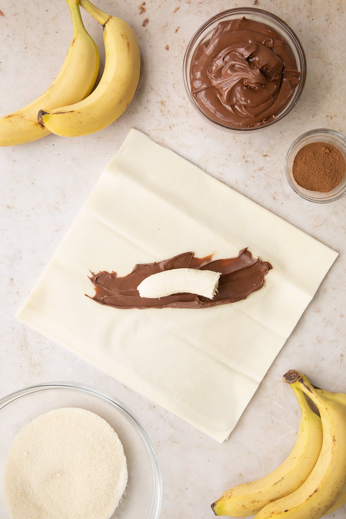 Overhead shot of the filo pastry topped with chocolate spread and half a banana.