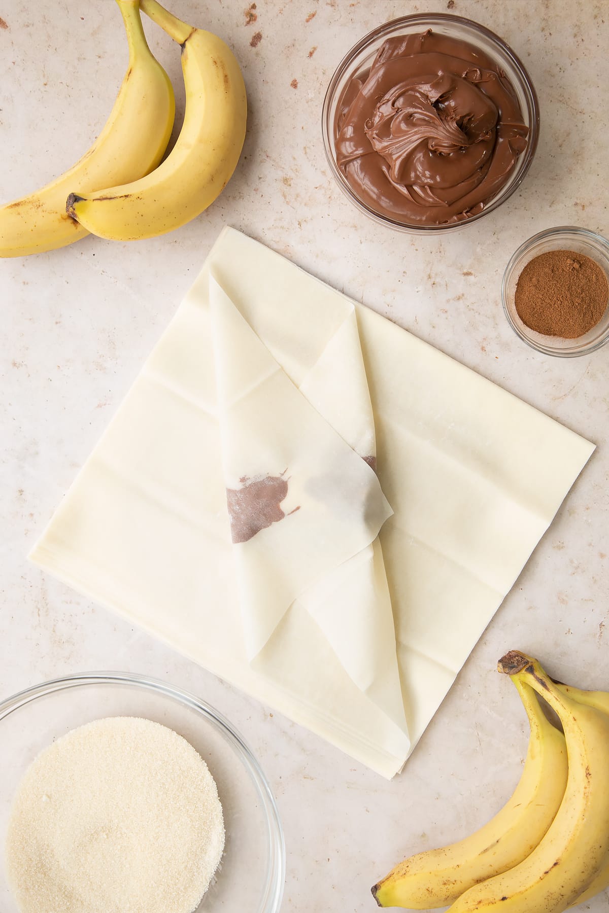 Overhead shot of the filo pastry being folded in.