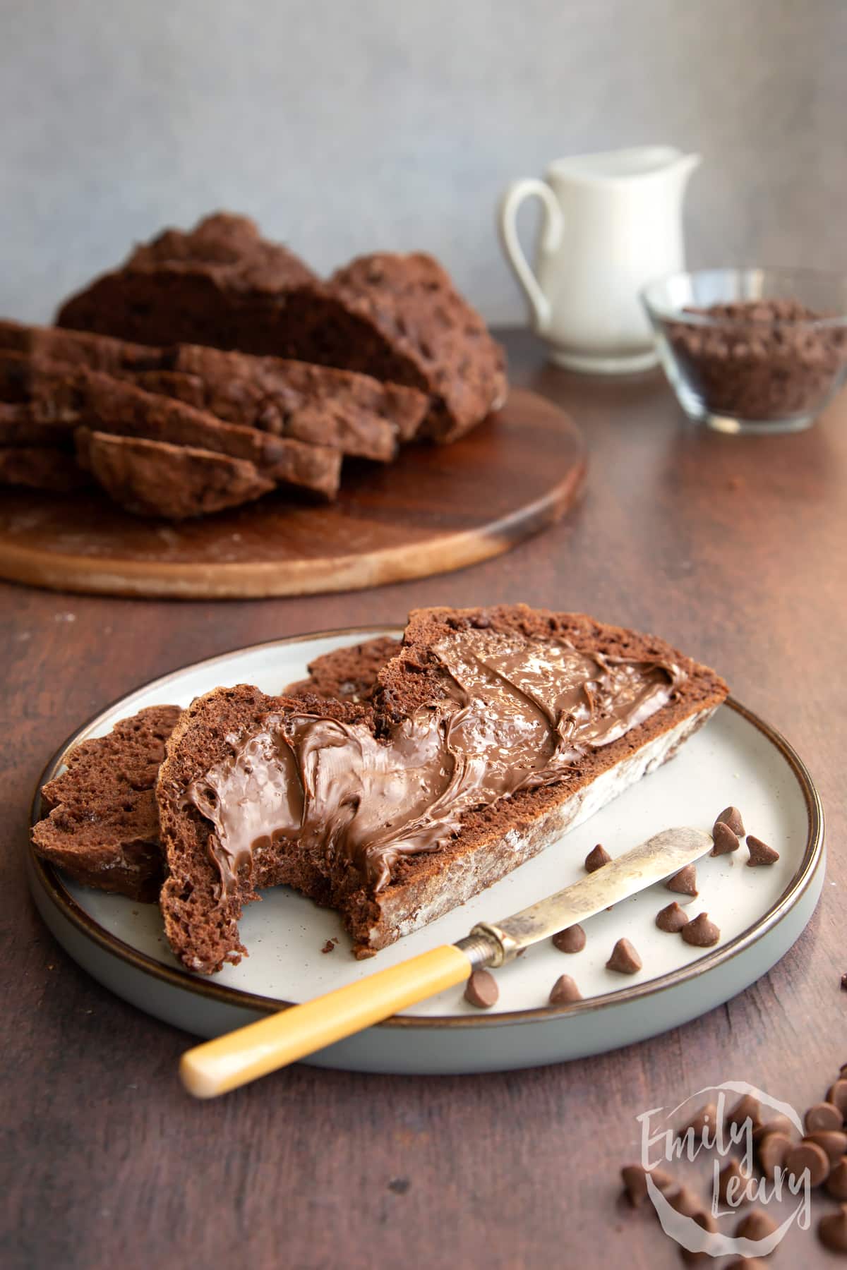 A finished slice of chocolate soda bread served on a decorative plate.