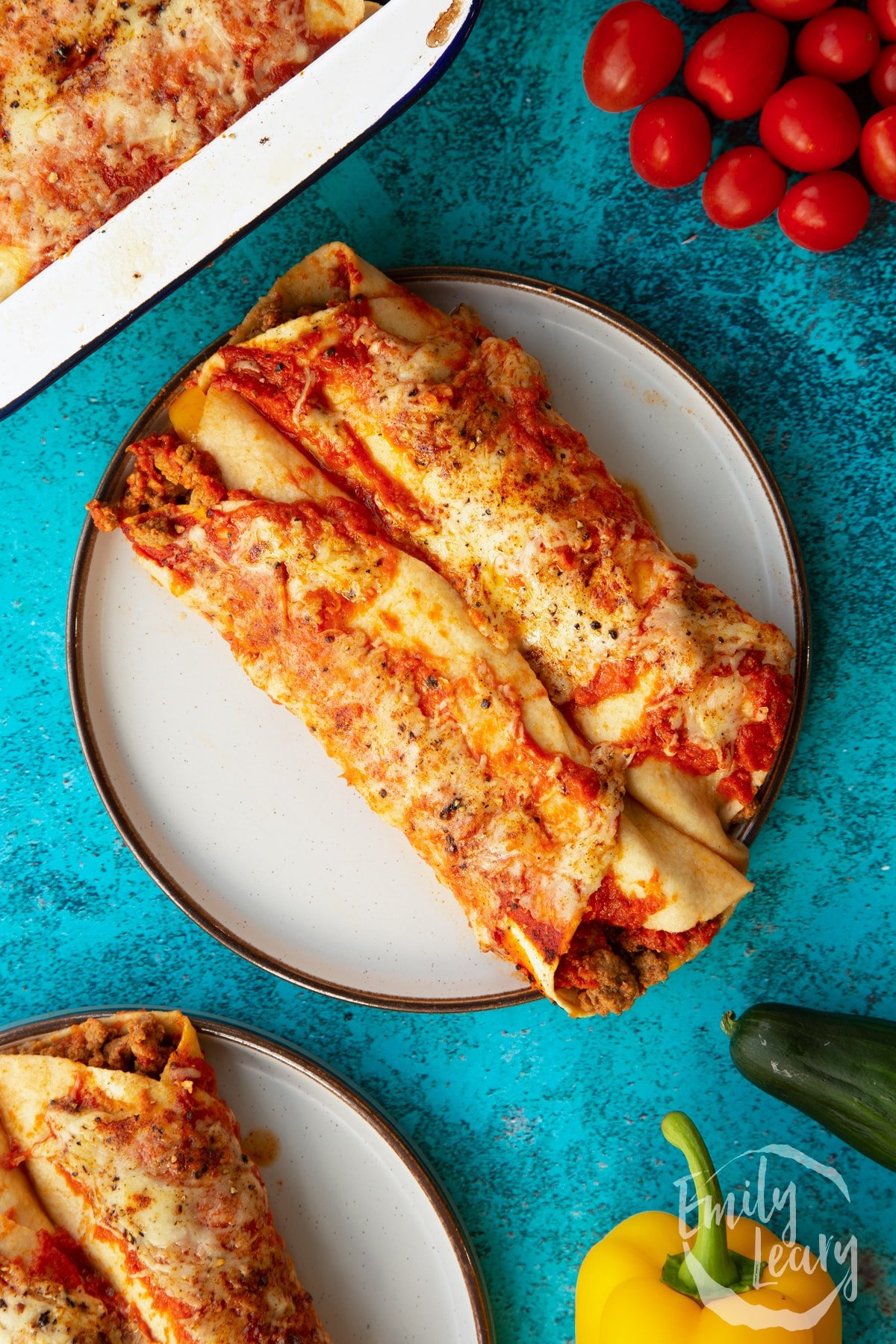 Quorn mince enchiladas served on a grey plate. Shown from above.