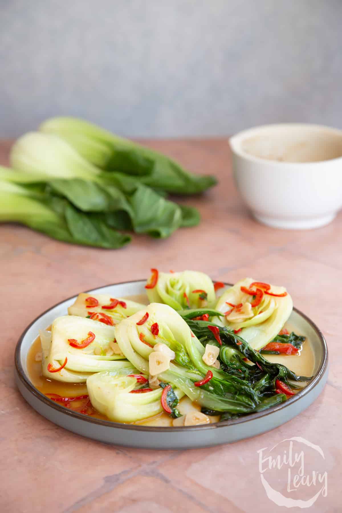 Side on shot of the spicy pak choi recipe on plate.