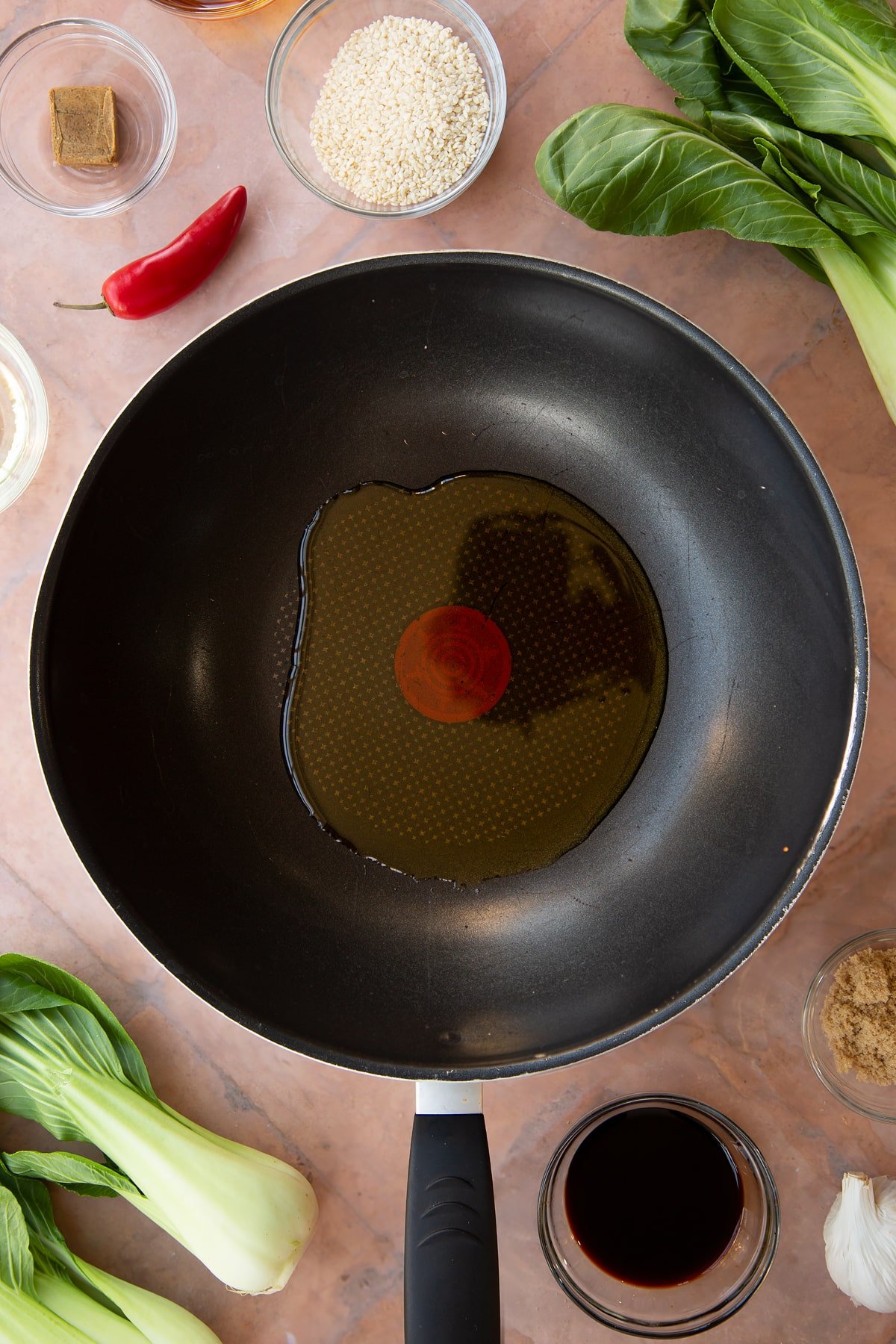 Overhead shot of some oil in a pan.