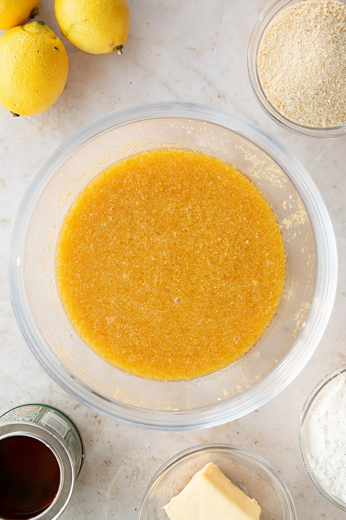 Overhead shot of the ingredients for the lemon treacle tart having been whisked together. 