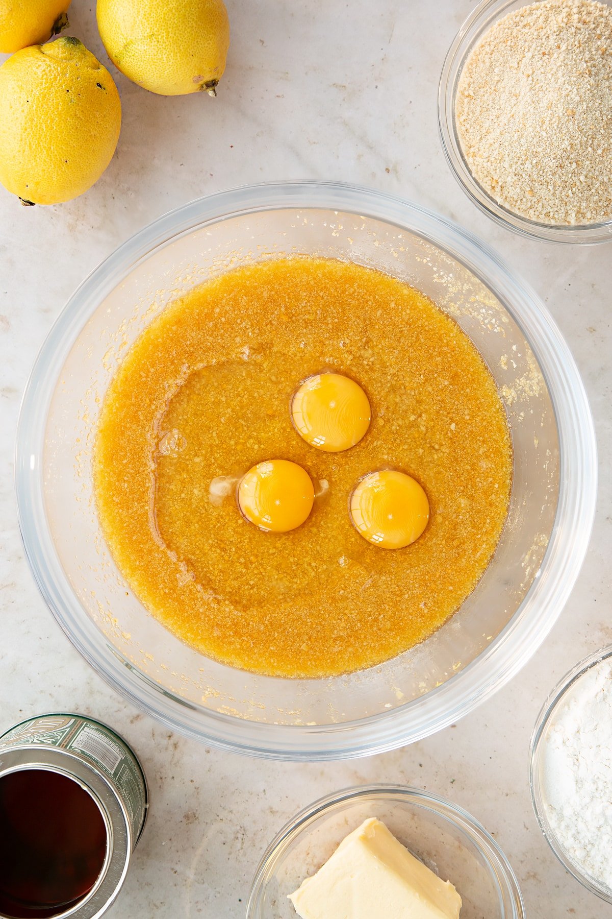 Overhead shot of the lemon treacle tart ingredients in a bowl.