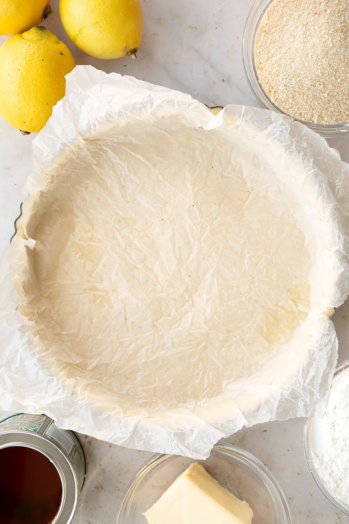 Overhead shot of the pastry tin lined with baking paper.