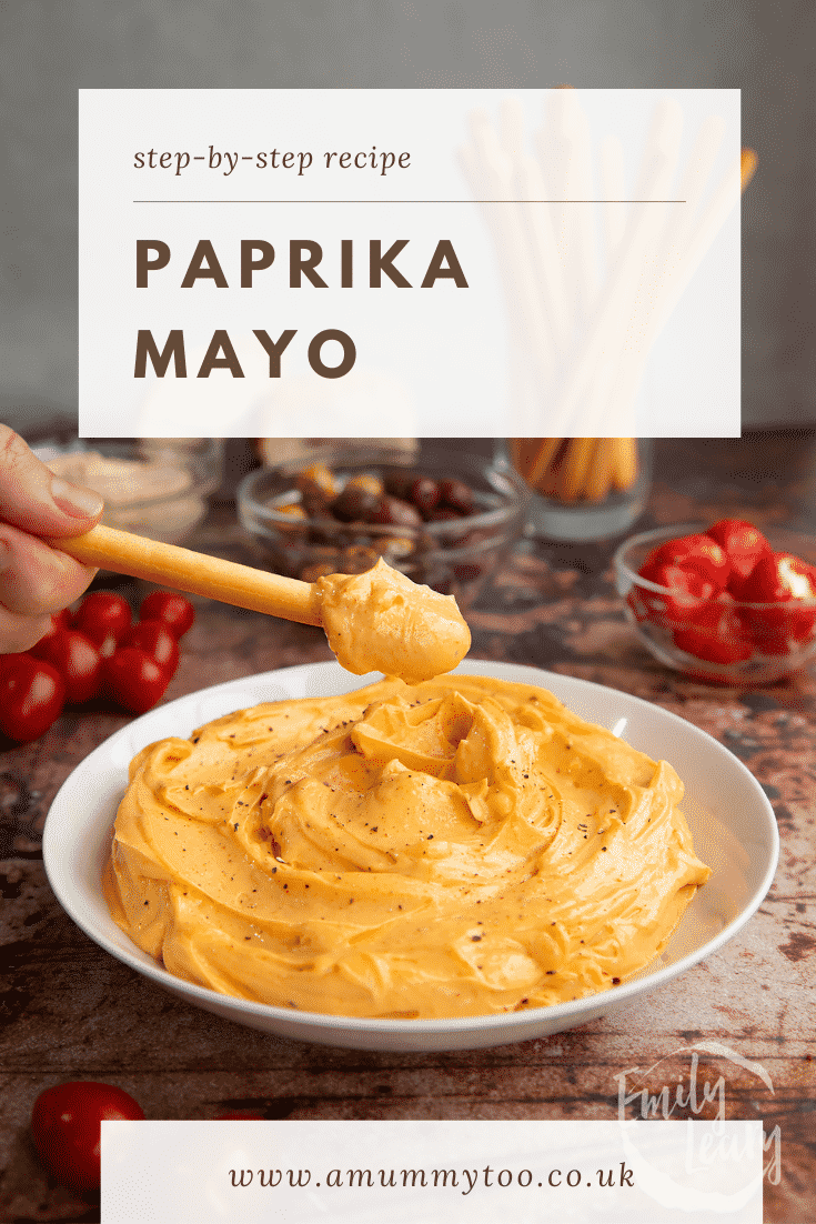 Paprika mayo in a shallow white bowl.  A breadstick is being dipped in. Caption reads: Step-by-step recipe paprika mayo