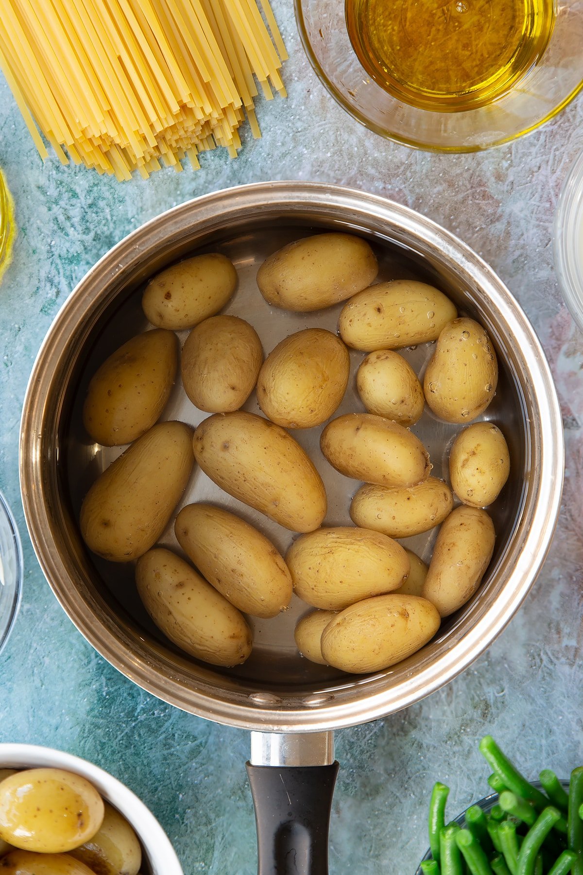 Overhead shot of potatoes in a pan.