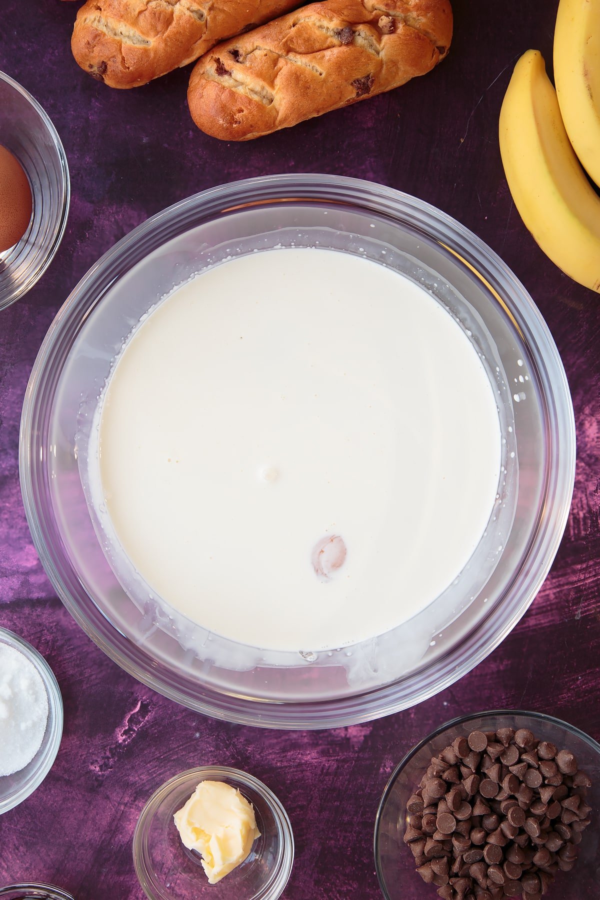 Overhead shot of some of the wet ingredients inside a mixing bowl.