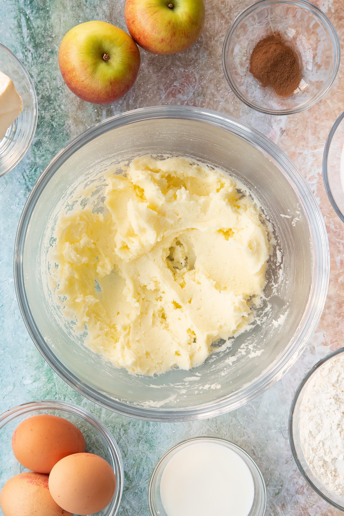 Sugar and butter whisked together in a large bowl.