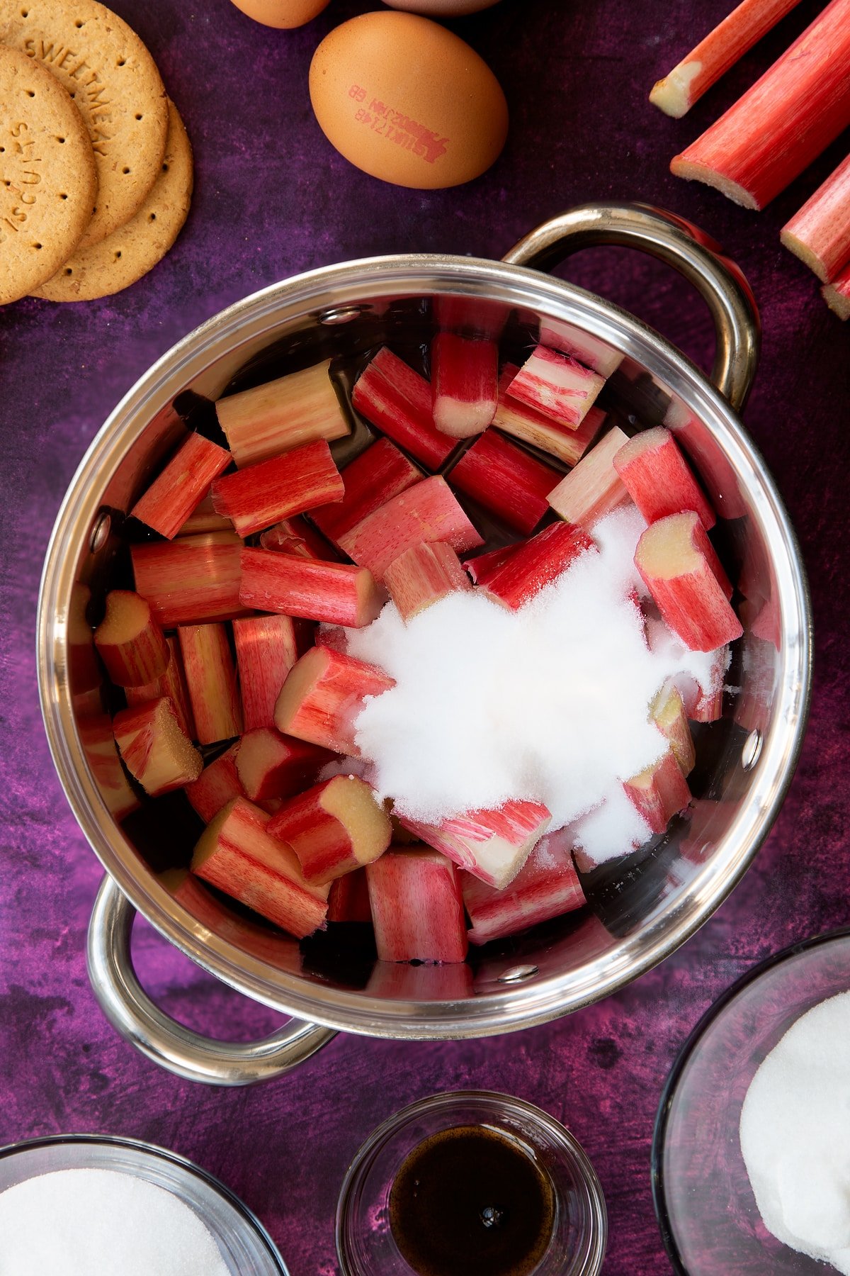 chopped rhubarb in large saucepan topped with sugar.