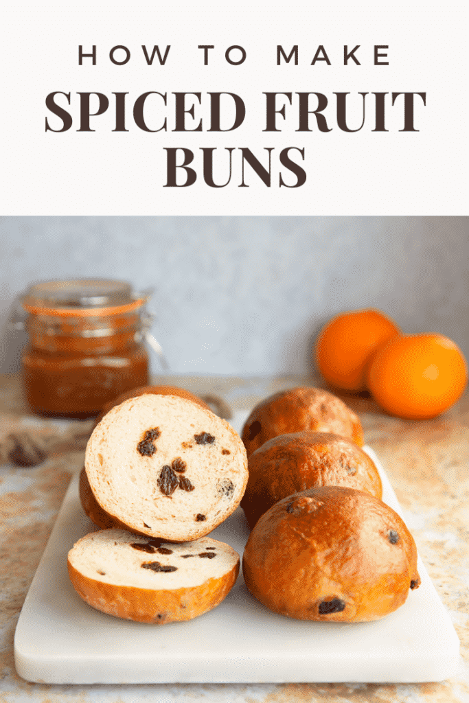 Pinterest image for the spiced fruit buns with text at the top describing the image for Pinterest.