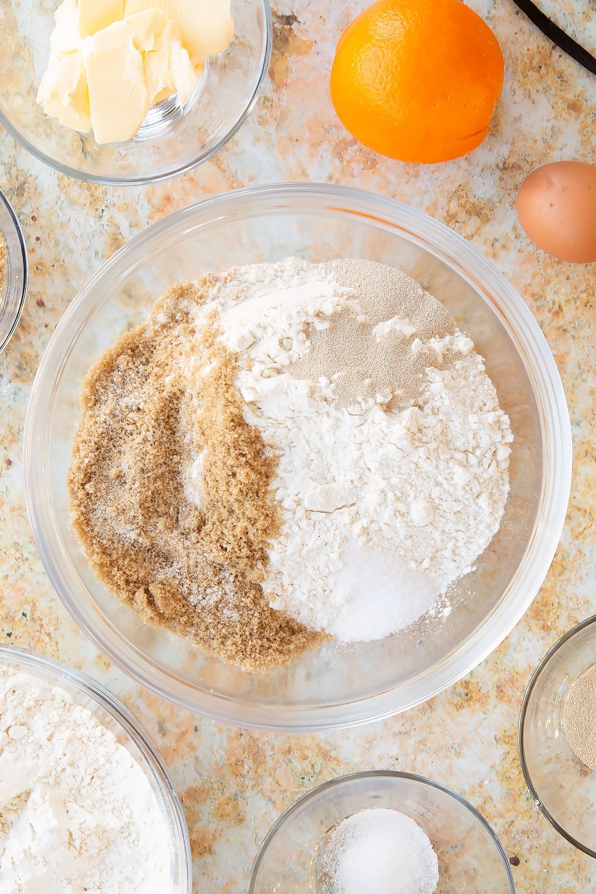 Overhead shot of some of the dry ingredients for the spiced fruit buns dough.