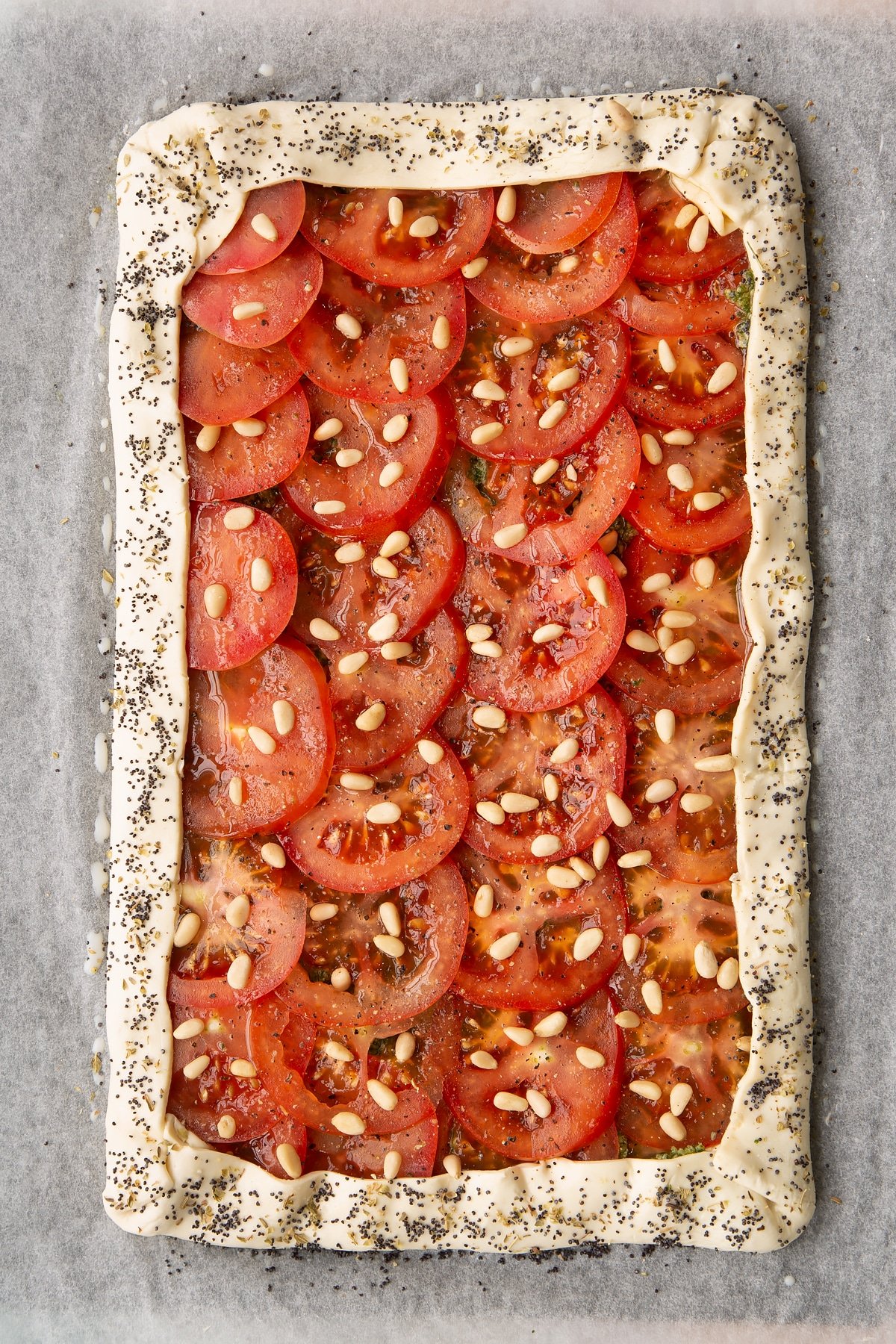 The finished uncooked tart on an oventray.