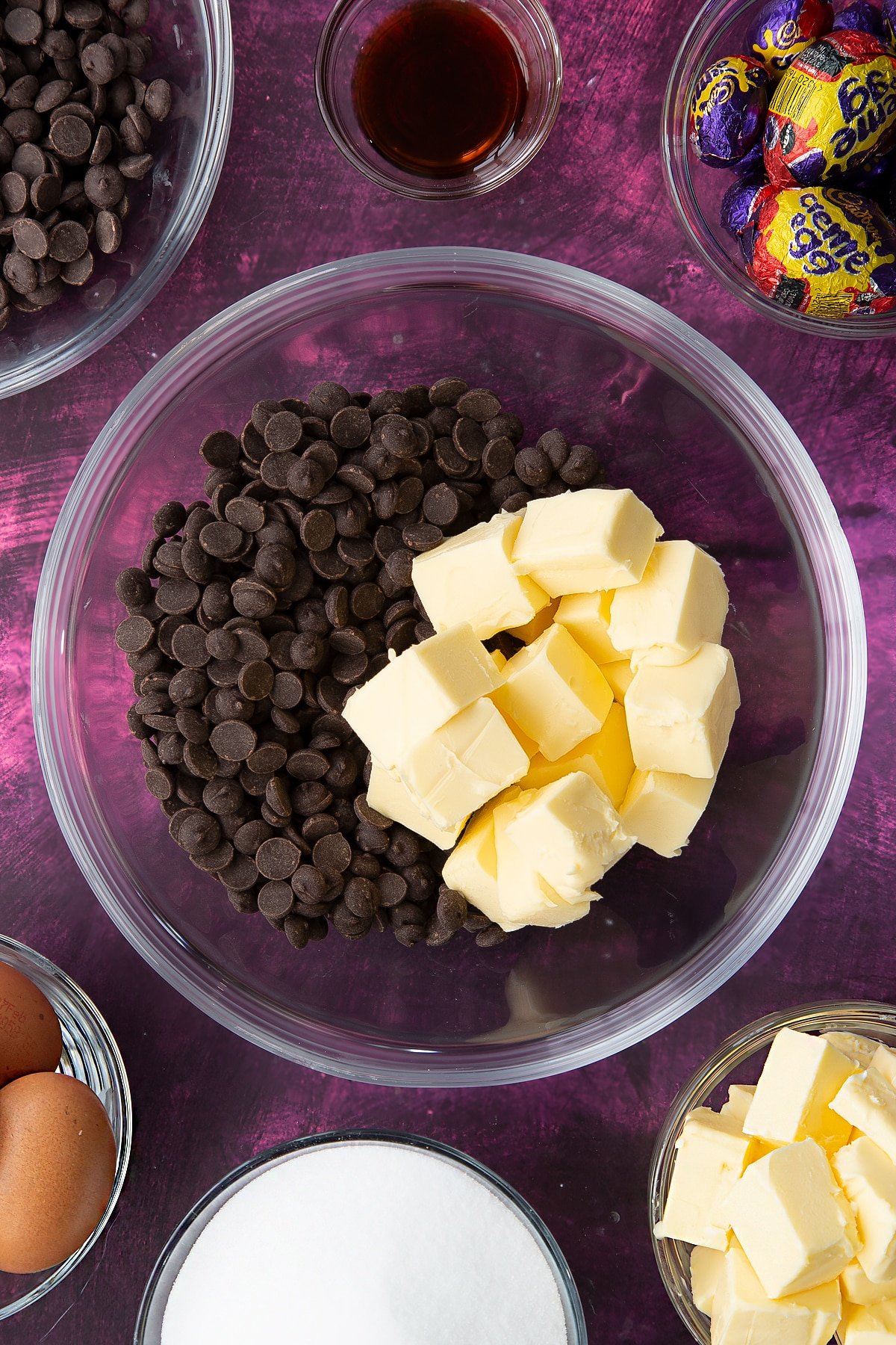 Butter and chopped dark chocolate in a large, heatproof bowl