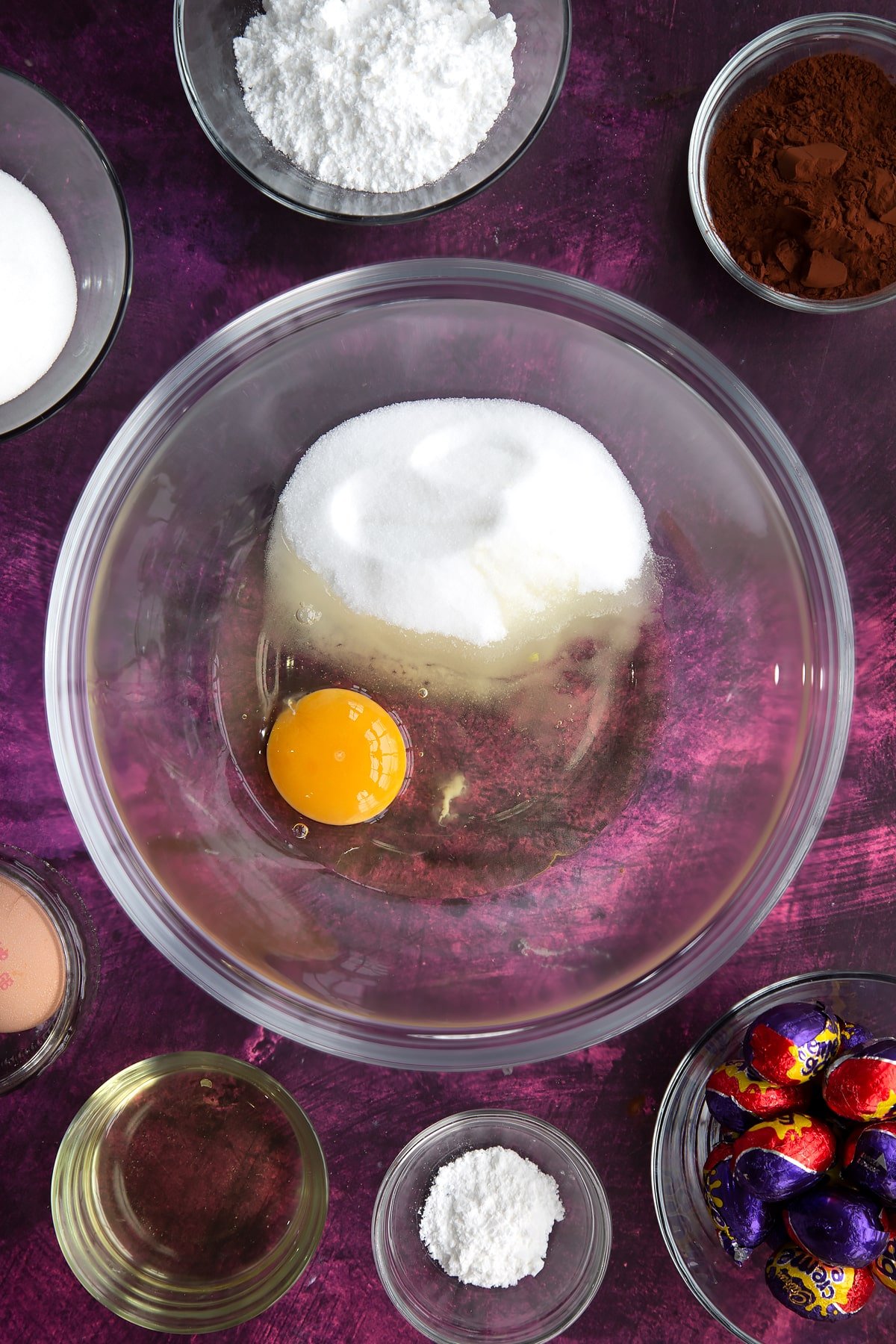 Overhead shot of egg and sugar in a mixing bowl.