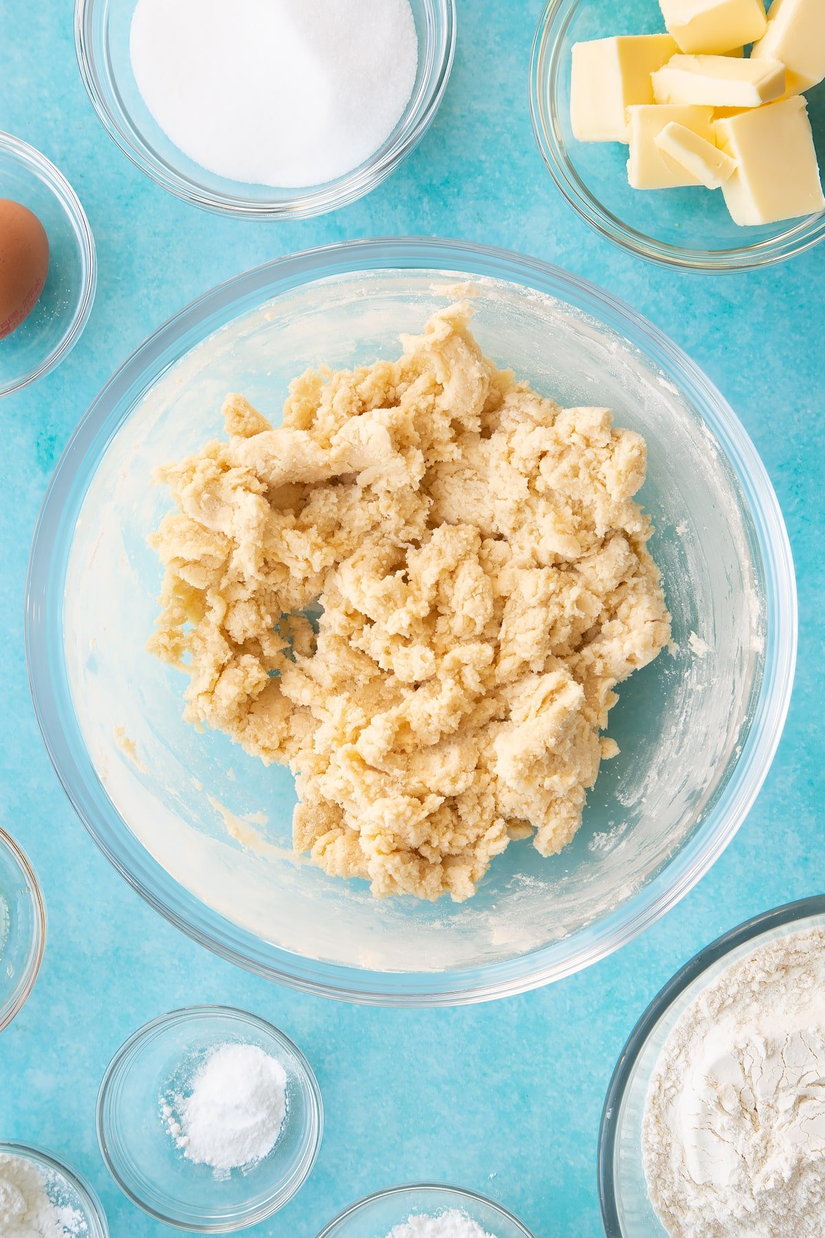 Stirring the dry ingredients until the mixture is smooth.