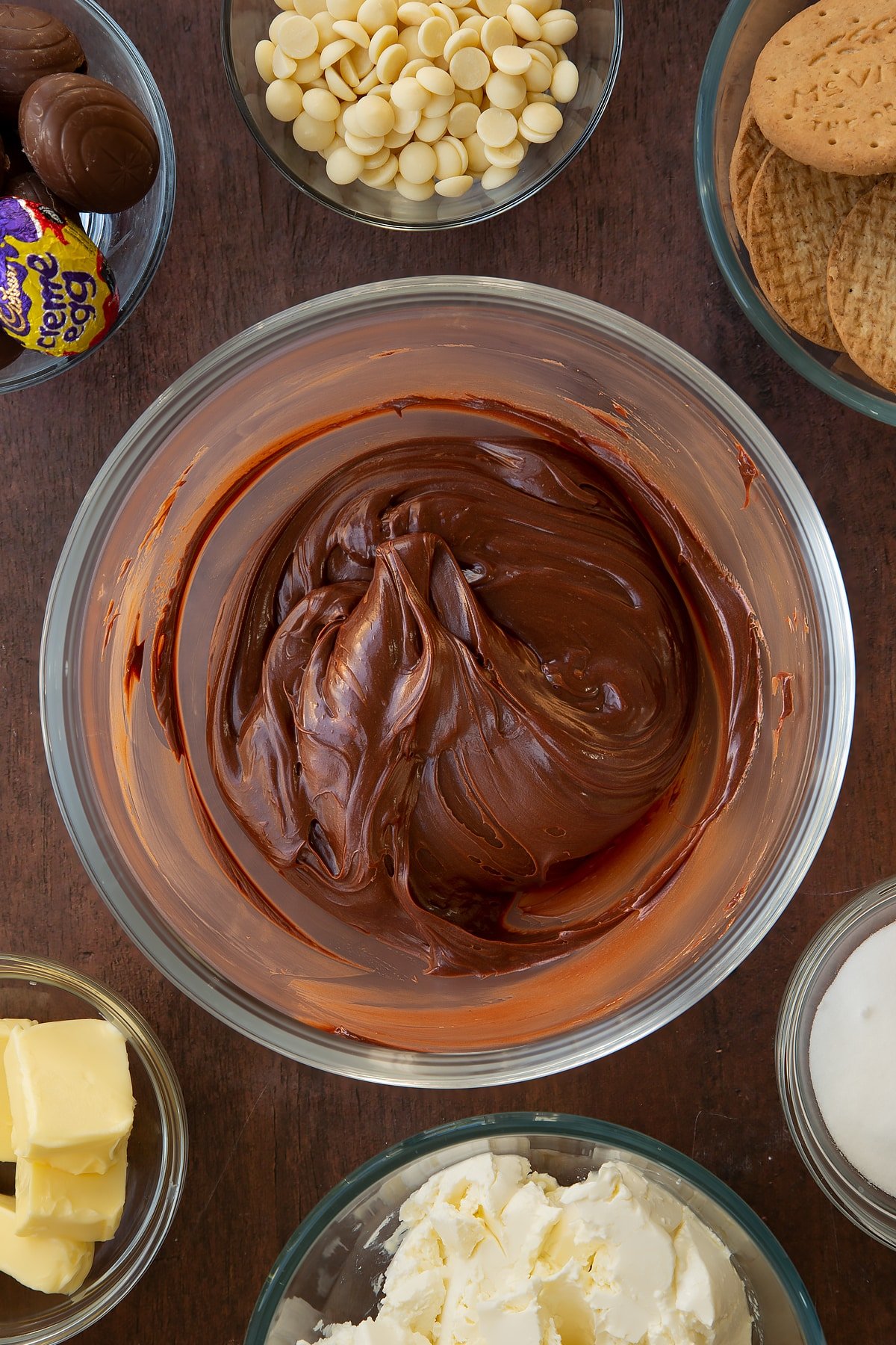 Overhead shot of the ganache for the Cadbury Creme Egg cheesecake after being in the fridge and left to cool for an hour.