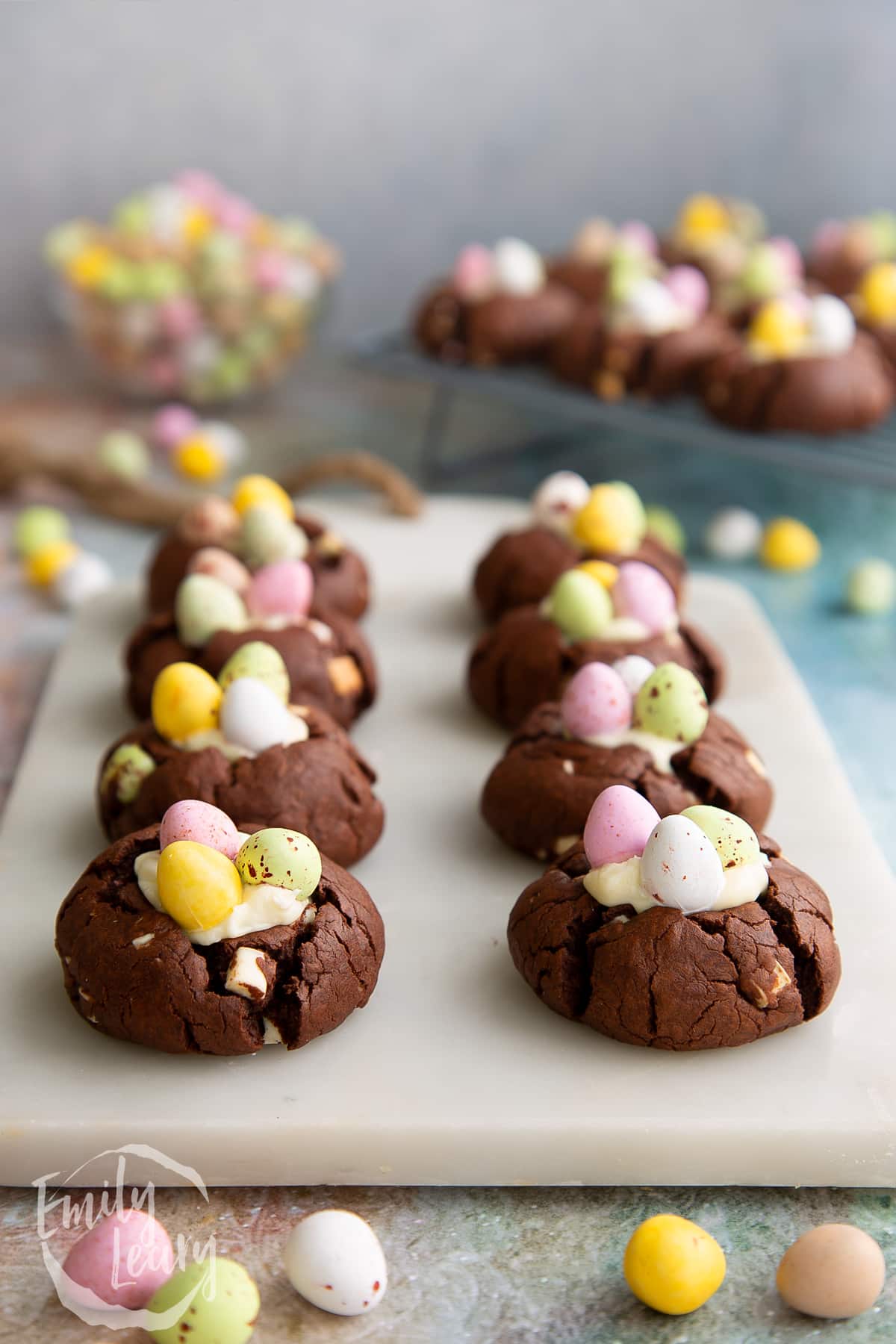 A finished serving of Easter cheesecake cookies on a marble board.