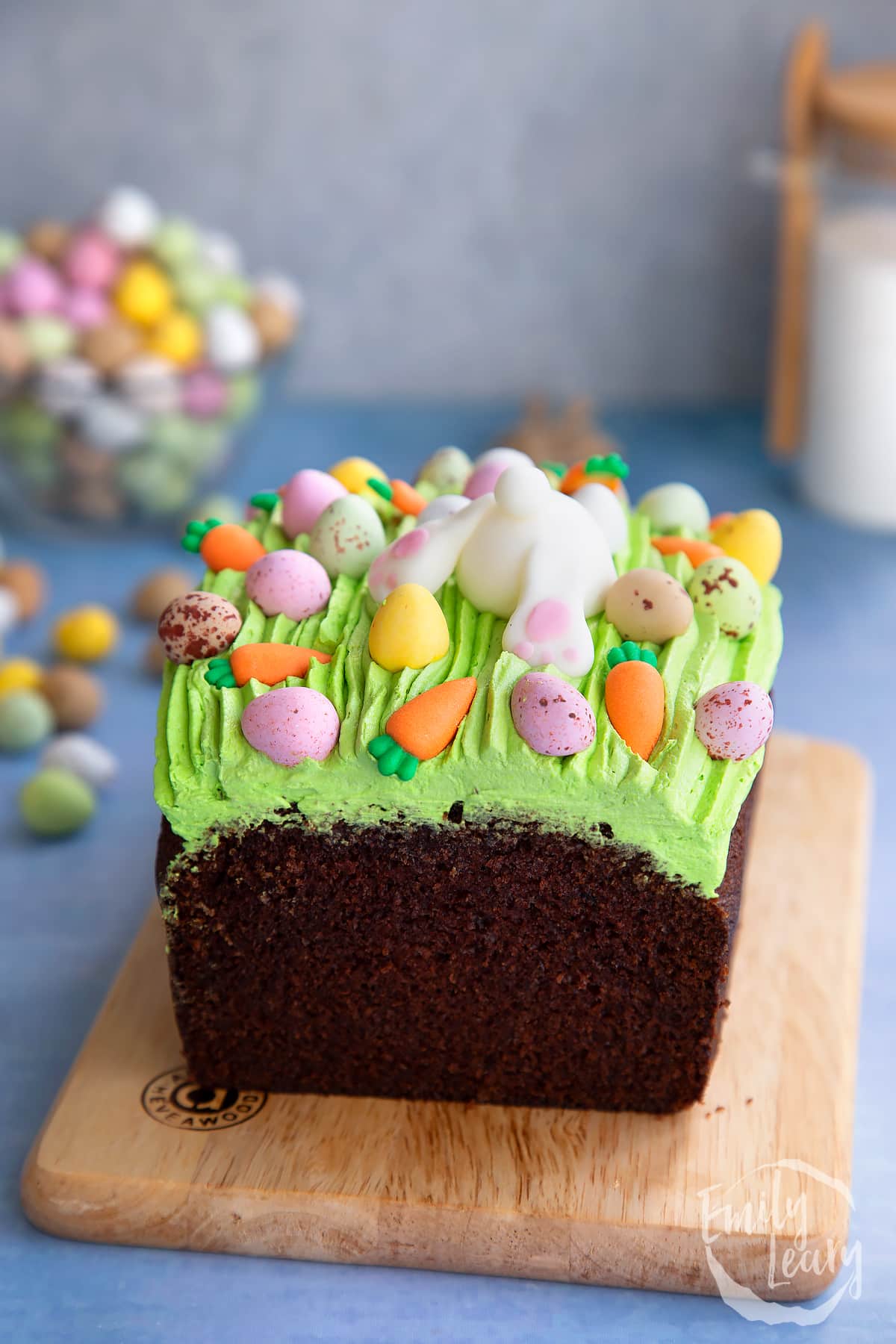 Finished Easter loaf cake served on a wooden board.