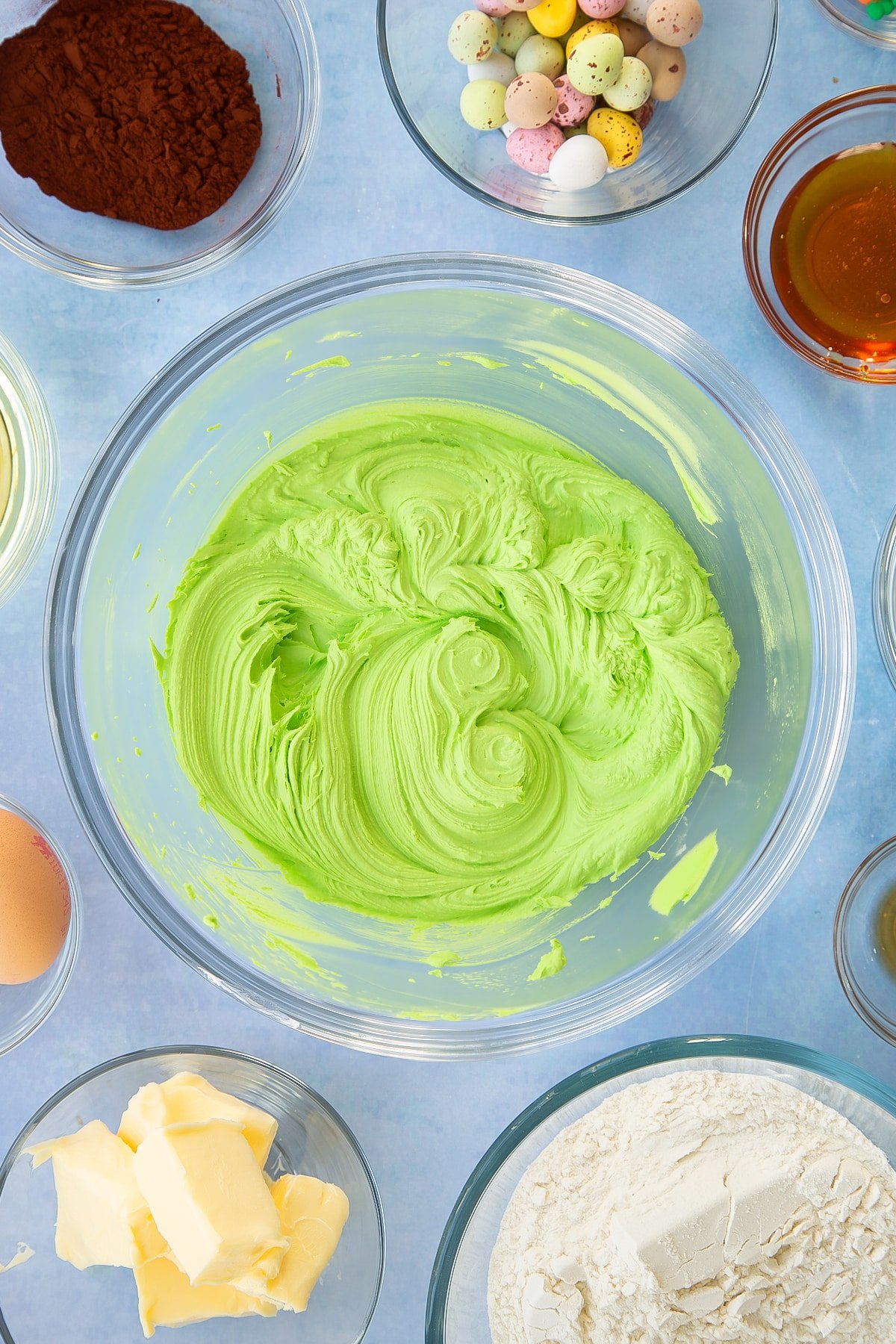 Whisked icing sugar with green food colouring. 