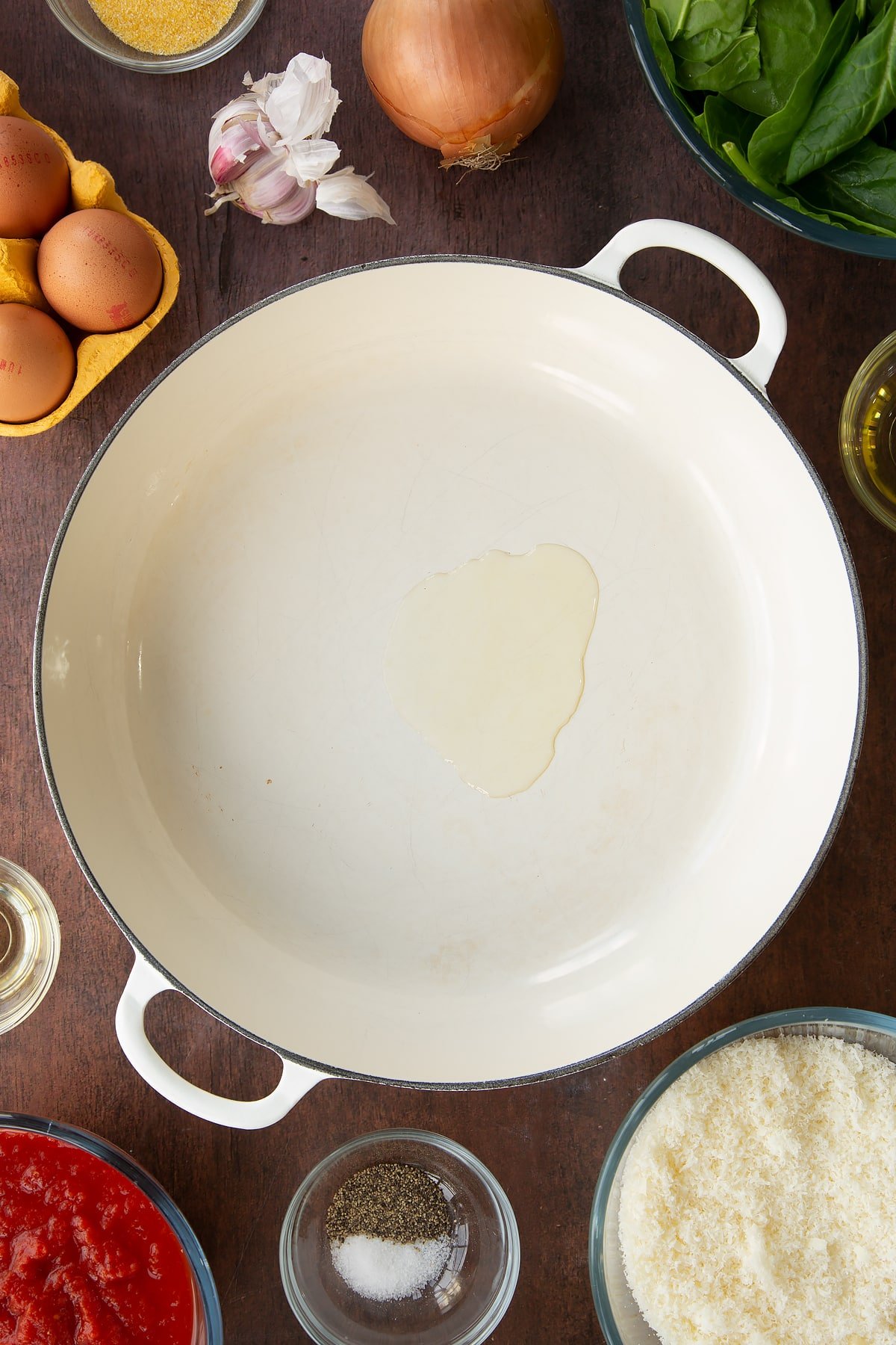 Overhead shot of oil melting in a pan.