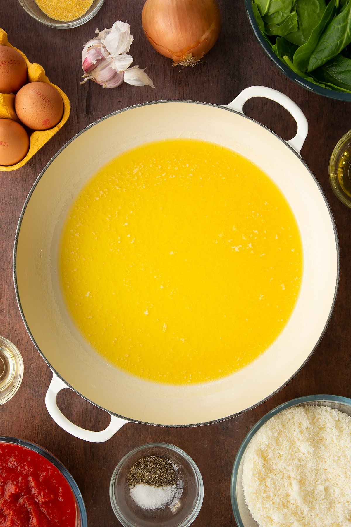 Overhead shot of the butter having melted in the pan.