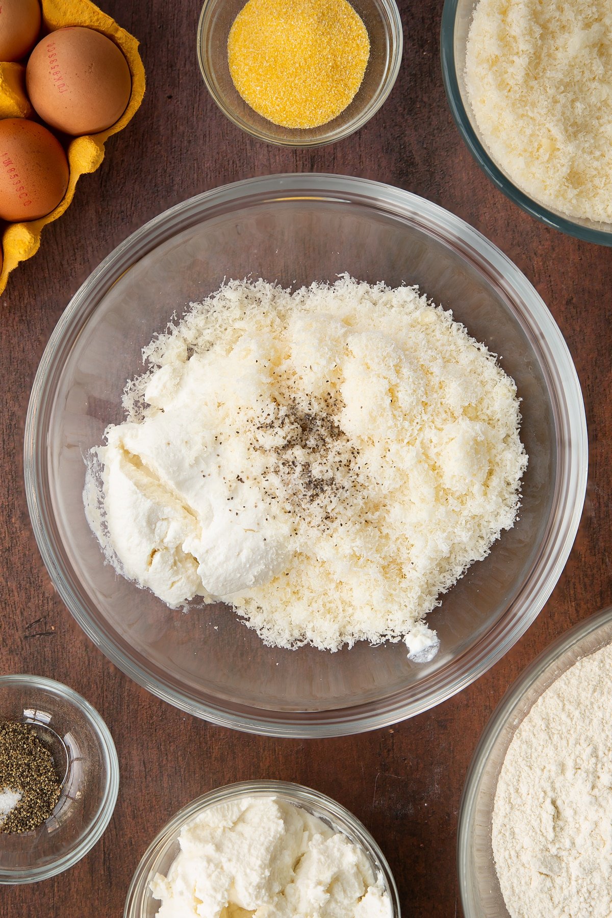 Ricotta, nutmeg, Parmesan and a pinch of salt and pepper in a bowl