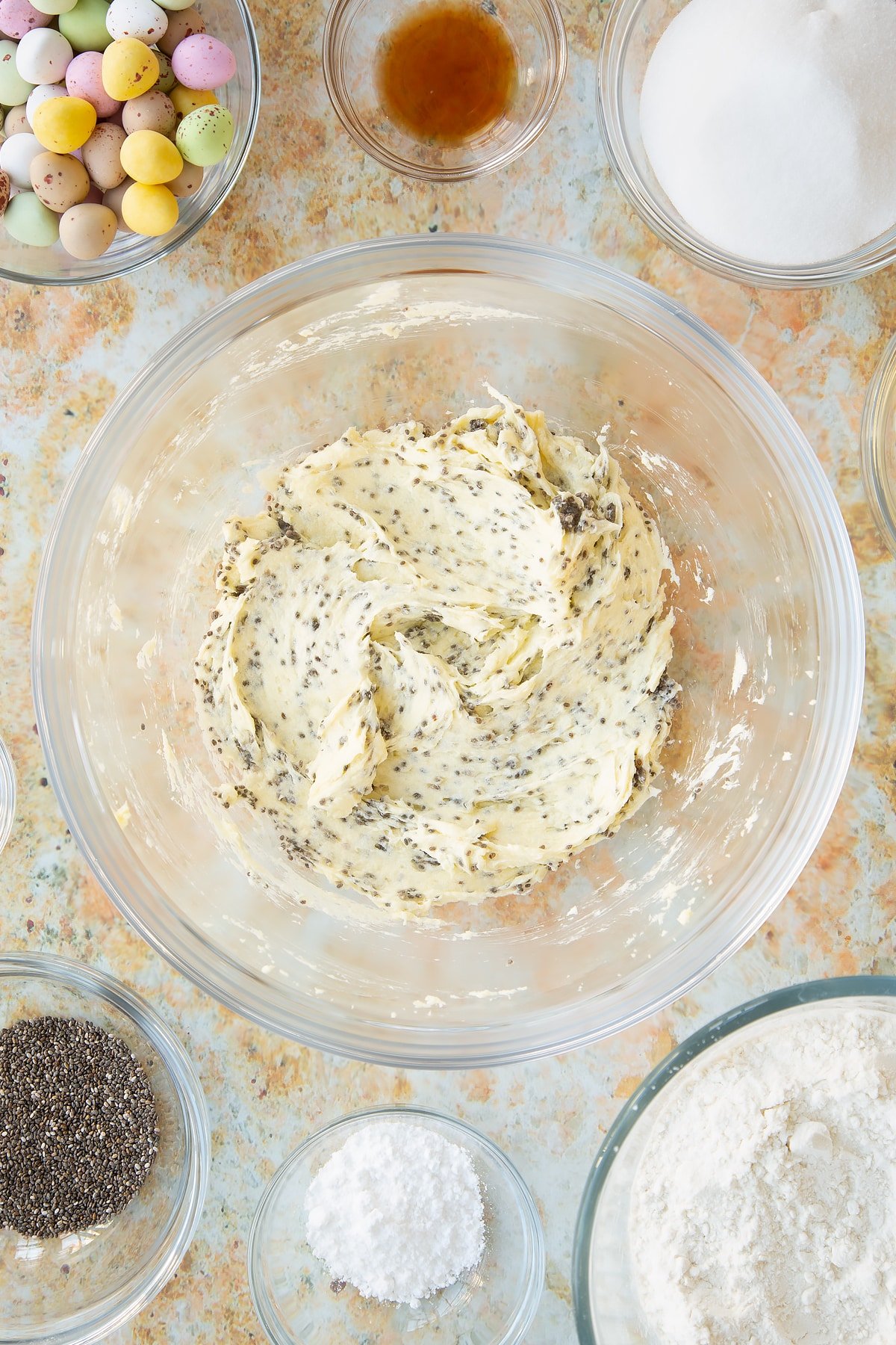 Overhead shot of the gluten free easter biscuits mixture after the vanilla and chia seeds have been stirred in.