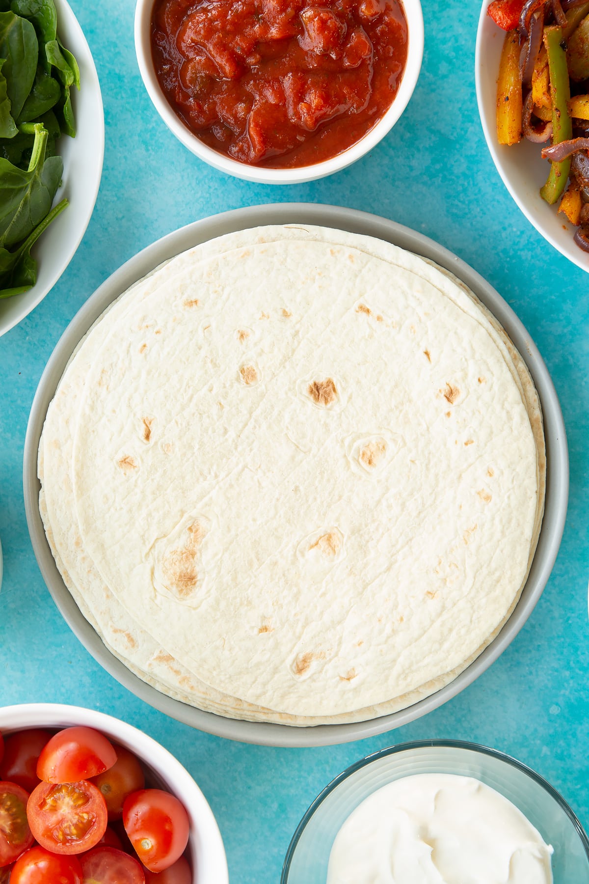 Overhead shot of tortillas on a plate.