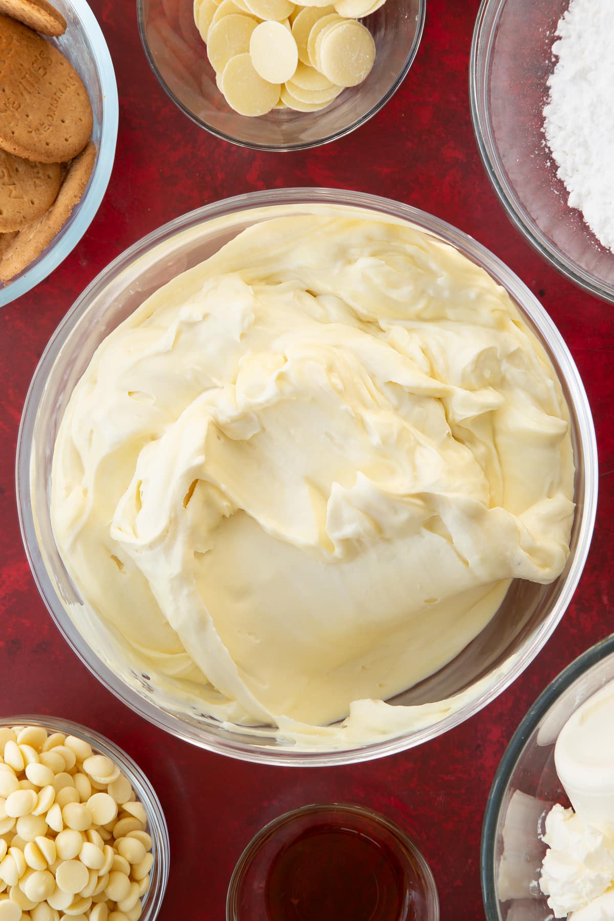 white chocolate cheesecake mixture in a large clear bowl.