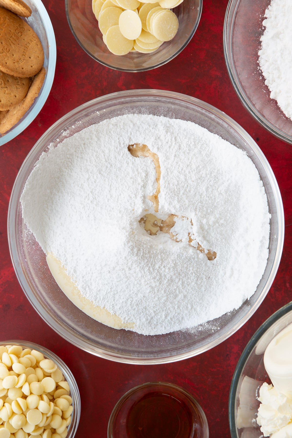 double cream, vanilla and icing sugar in a large clear bowl.