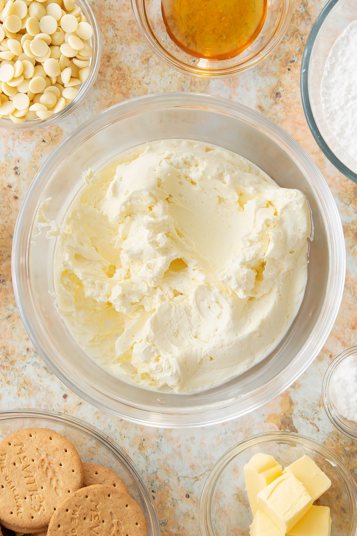 whisked double cream and icing sugar in a large bowl.