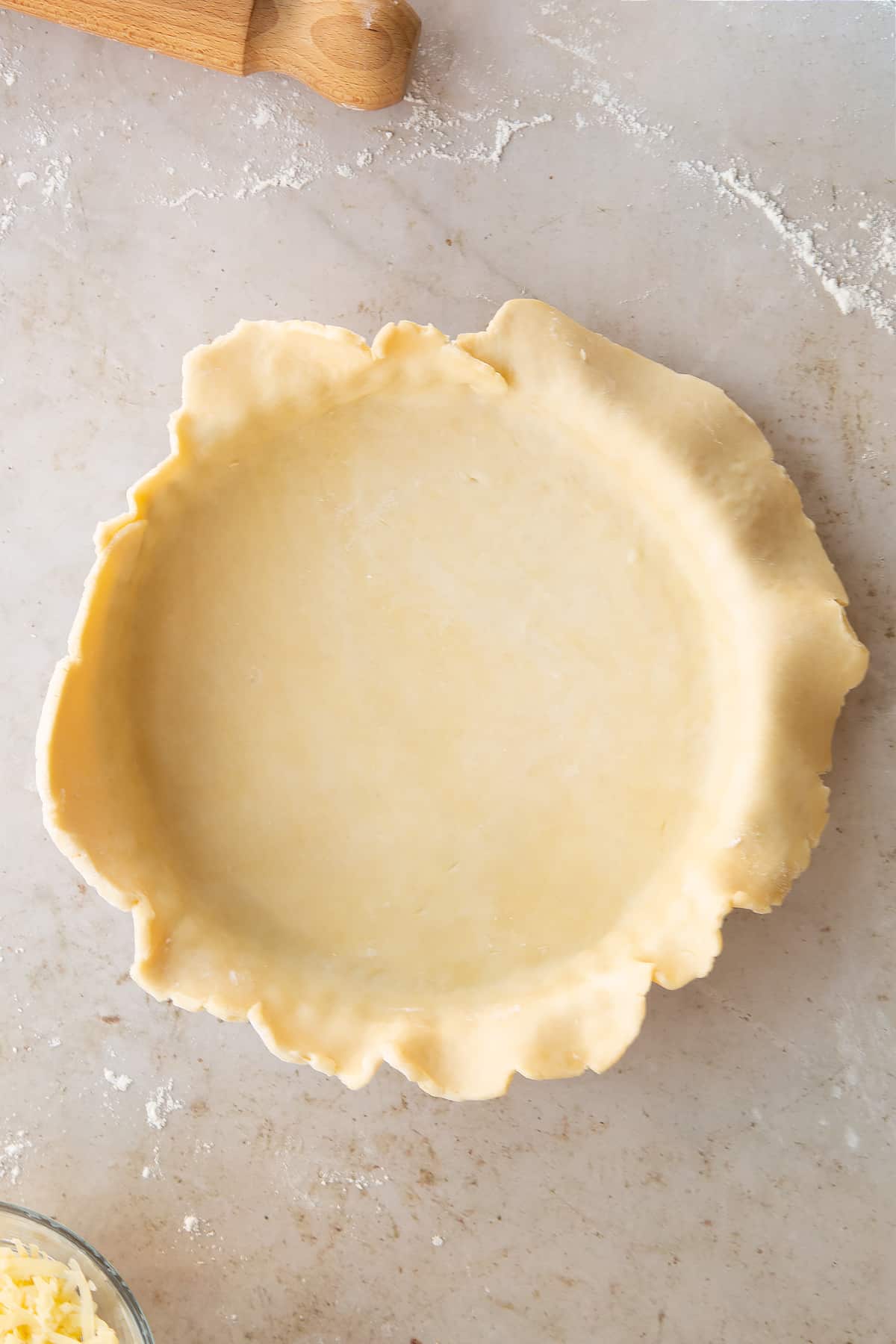 shortcrust pastry loosely pput into a pie dish.