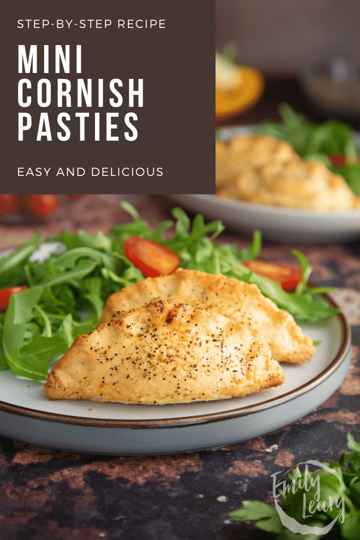 Pinterest image for the mini cornish pasties. The image is of the mini cornish pasties on a decorative plate served with a side salad and at the top is some text describing the image.
