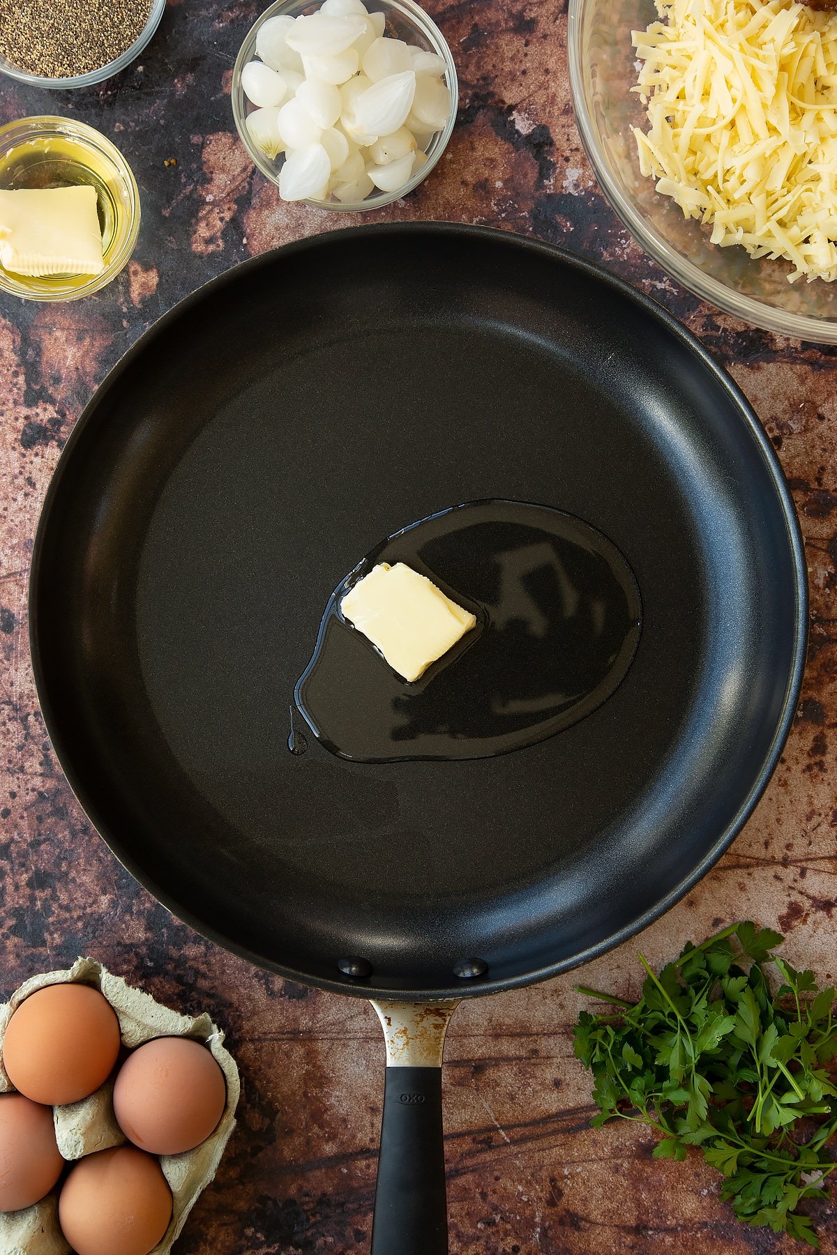 Overhead shot of a pan with melted butter.