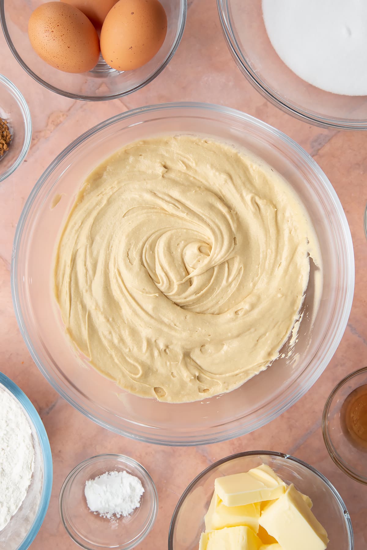 mixed coffee cake mix in a large clear bowl.